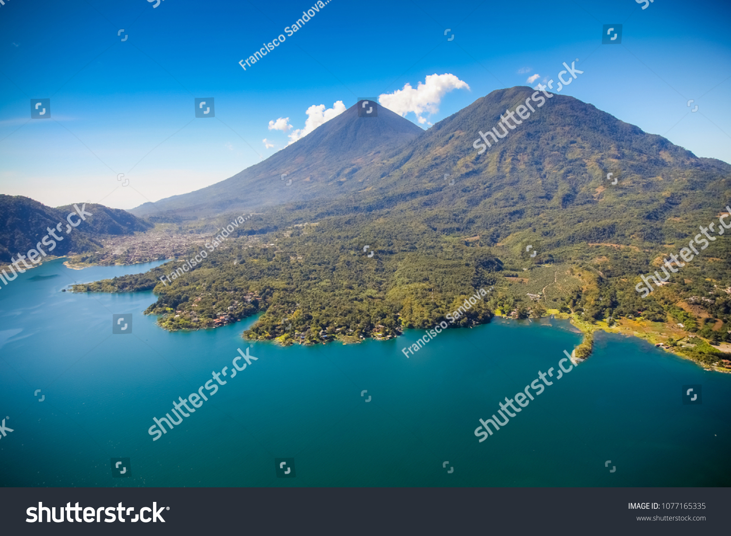 Aerial view of the area of Santiago Atitlan in Sololá Guatemala. On the back, Atitlán Volcano. #1077165335