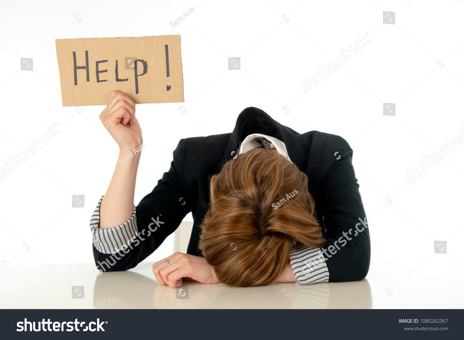 young beautiful red haired caucasian business woman overwhelmed and desperate holding a help sign. looking Stressed, bored, frustrated, upset and unhappy at work. business frustration concept. #1080262367