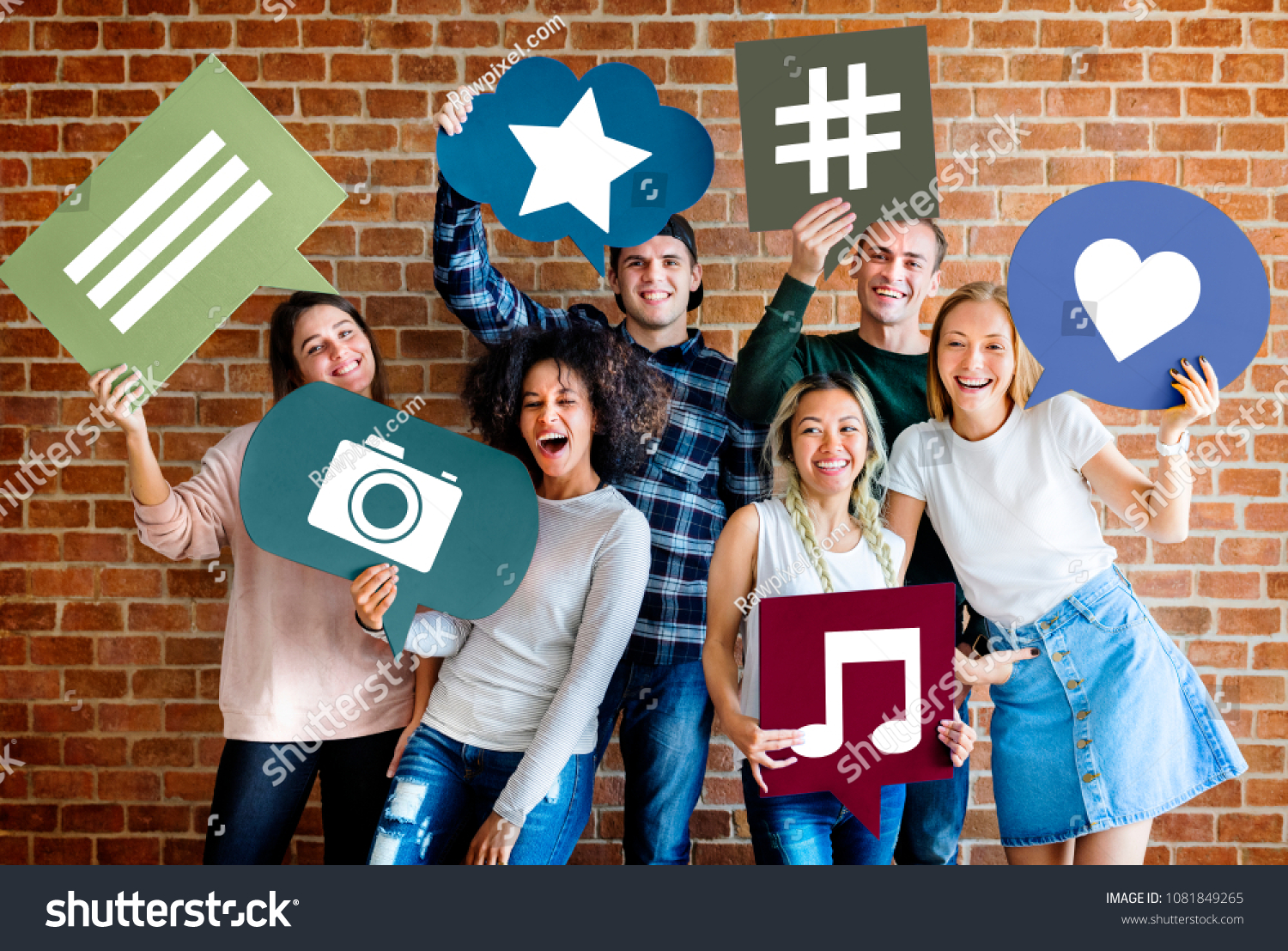 Happy young adults holding thought bubble with social medai concept icons #1081849265
