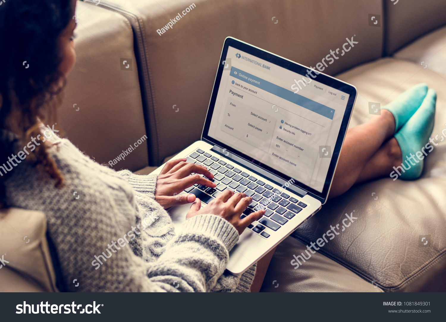 Woman working on a laptop #1081849301