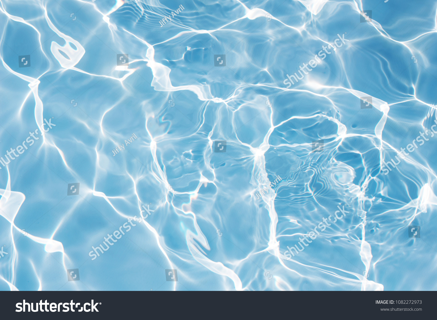 Texture of water in swimming pool for background #1082272973