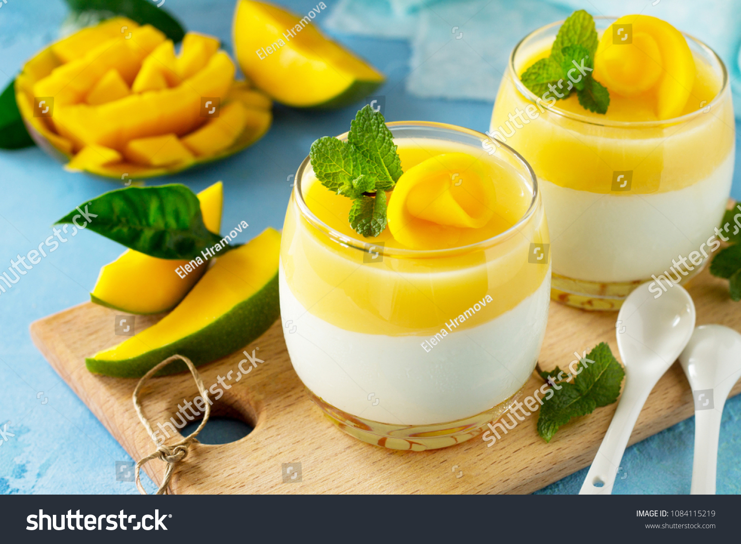 Mango Panna cotta with mango jelly and mint, Italian dessert, homemade cuisine. #1084115219