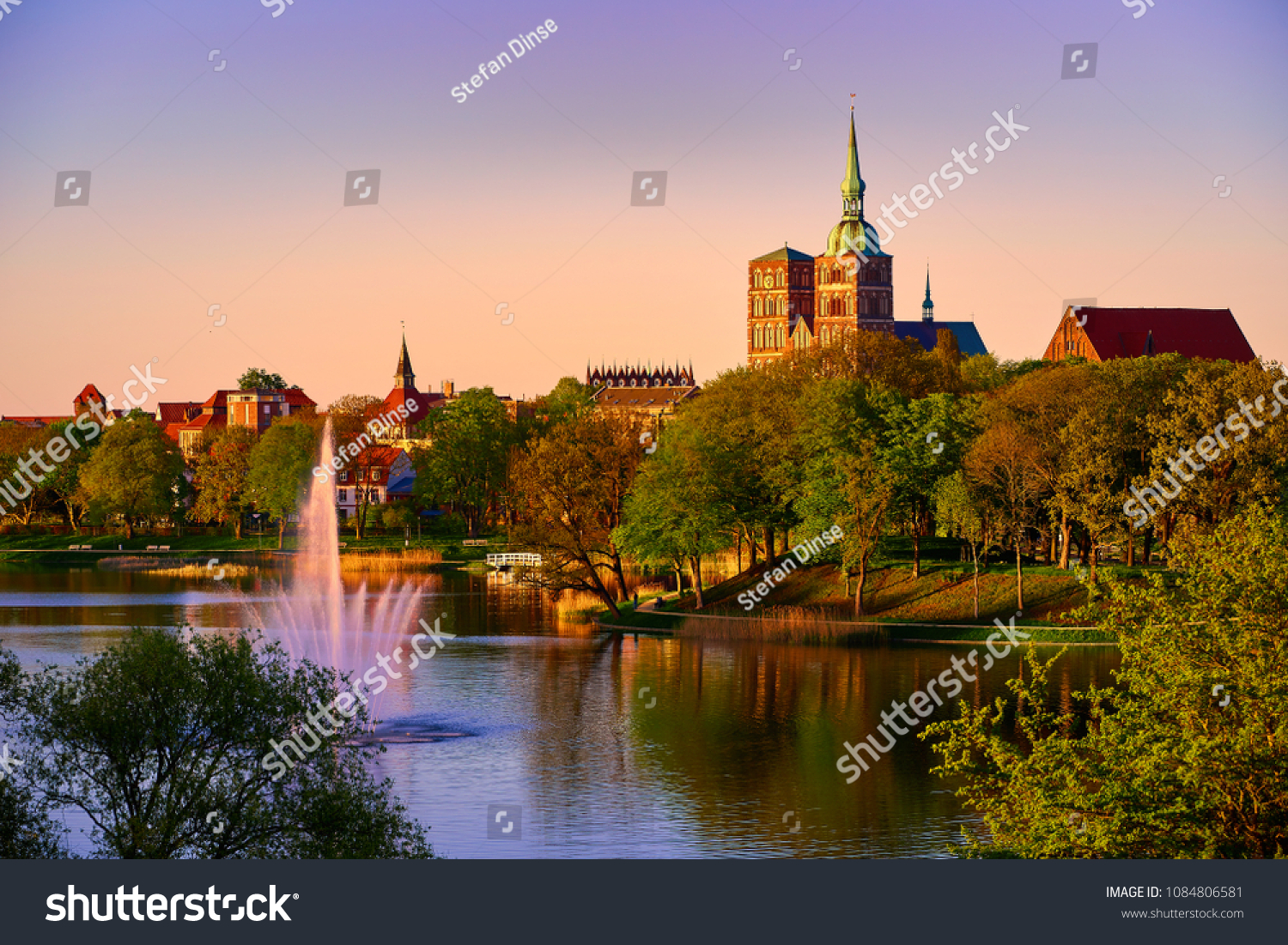 evening scene with skyline of historic Stralsund #1084806581