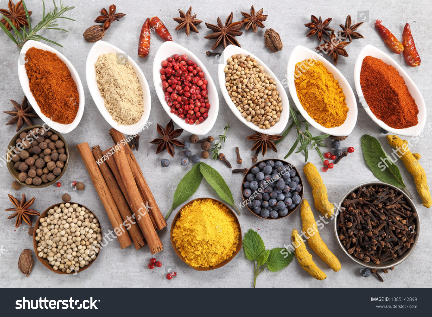 Colorful and aromatic spices and herbs. Food additives. #1085142899