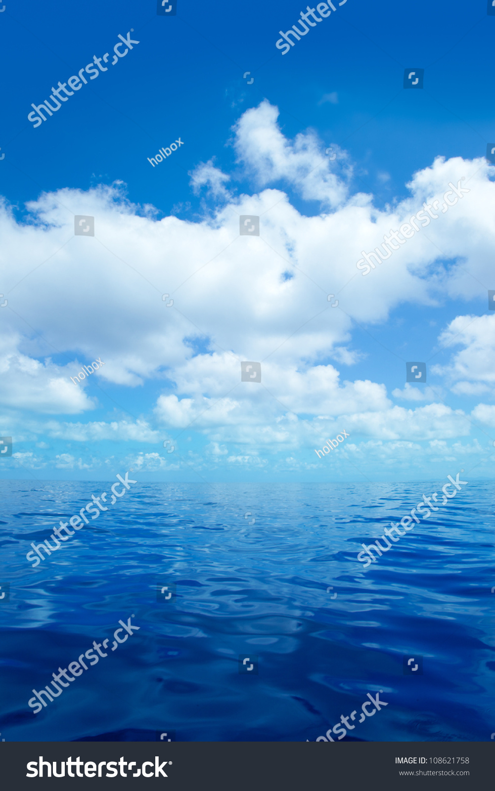 Blue calm sea water in offshore ocean with clouds mirror surface #108621758