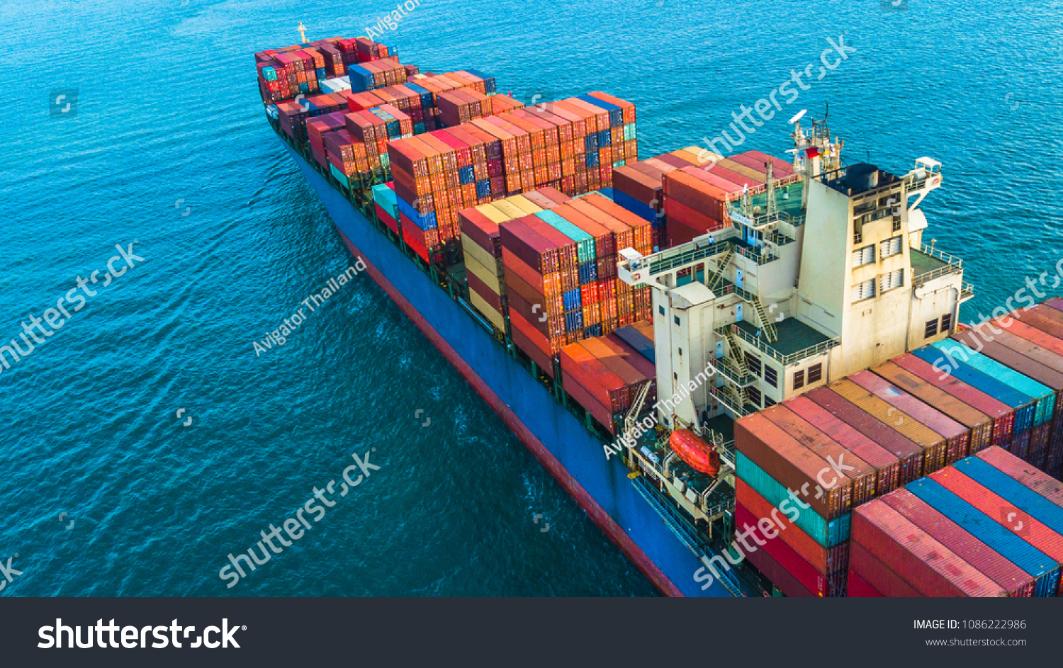 Container ship, Aerial view business logistic and transportation of International by container ship in the open sea. #1086222986