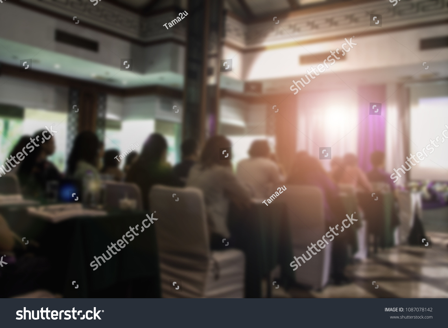 Abstract blurred photo background of business people in conference hall or seminar room.
Bokeh business meeting conference training learning coaching concept. #1087078142