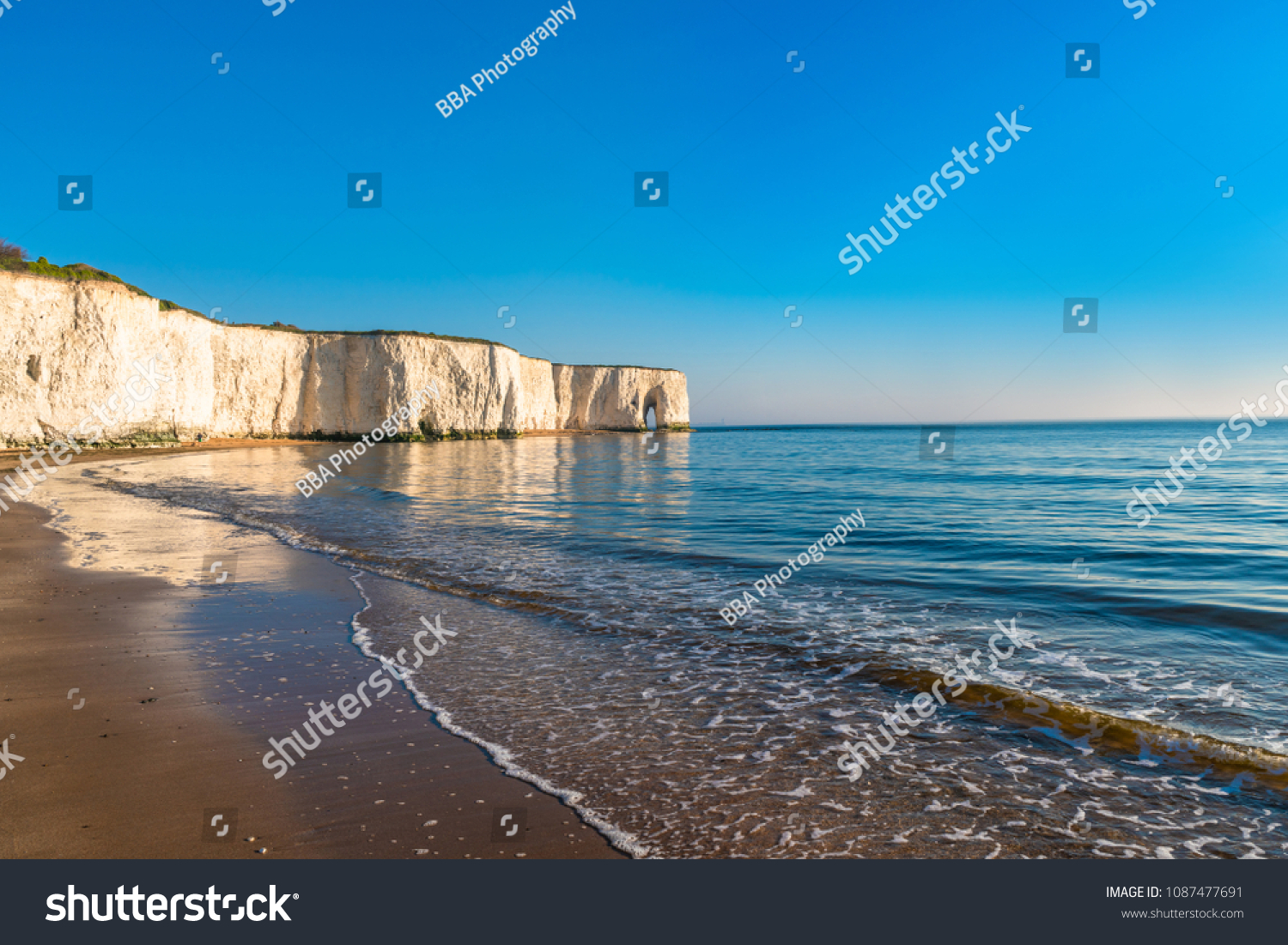 View of white chalk cliffs and beach in Kingsgate Bay, Margate, East Kent, UK #1087477691