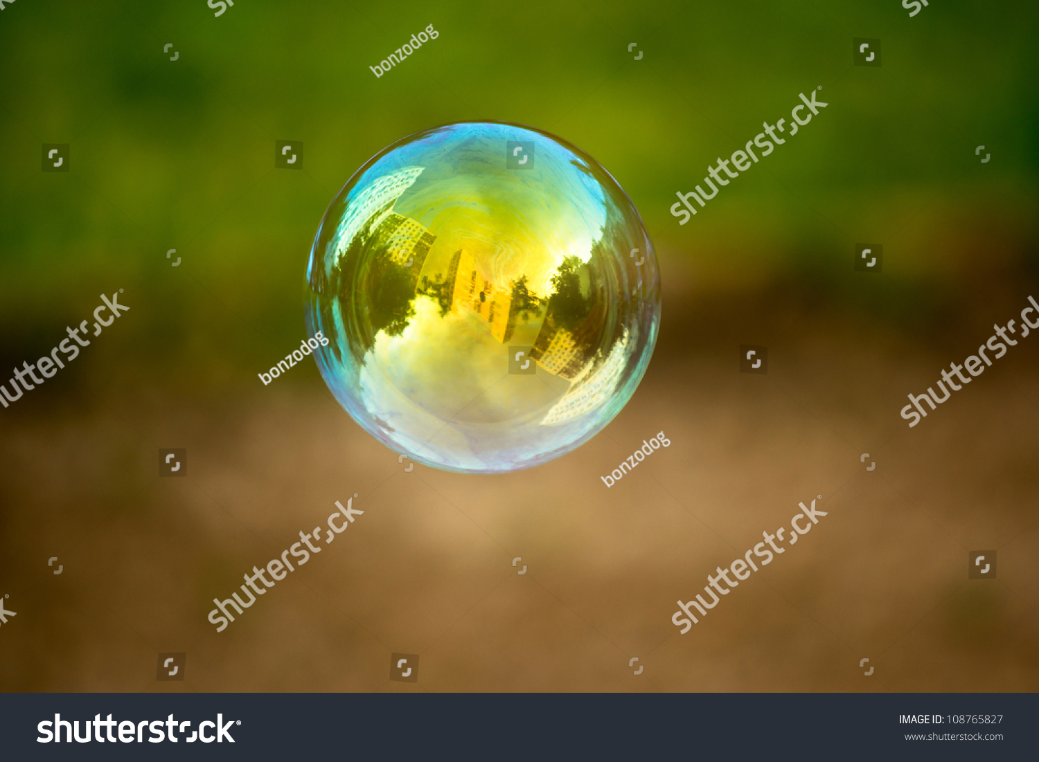 Soap bubble flying. Houses reflected in. #108765827