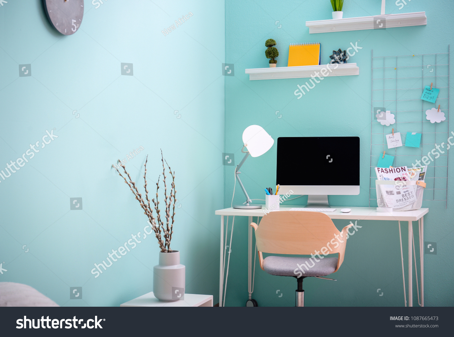 Comfortable workplace with computer on desk in home office #1087665473