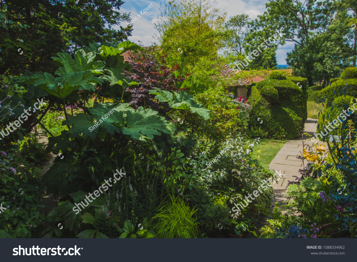 Great Dixter is a house and gardens in Northiam, East Sussex #1088334962