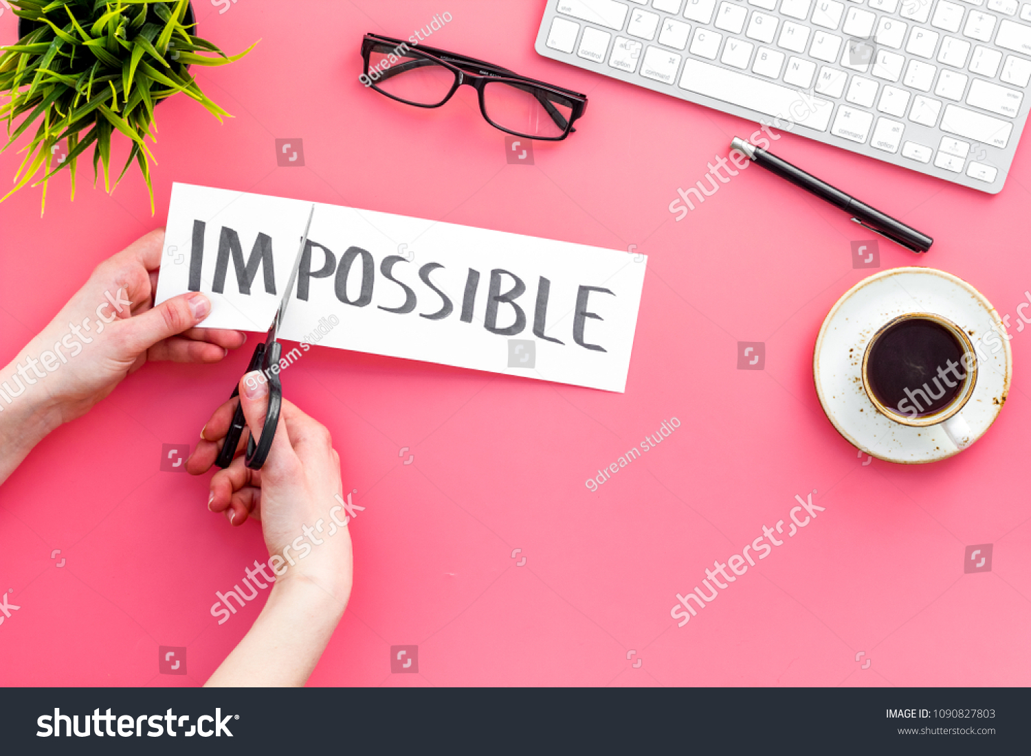 All is possible concept. Cutting the part im of written word impossible by sciccors. Pink background top view copy space #1090827803