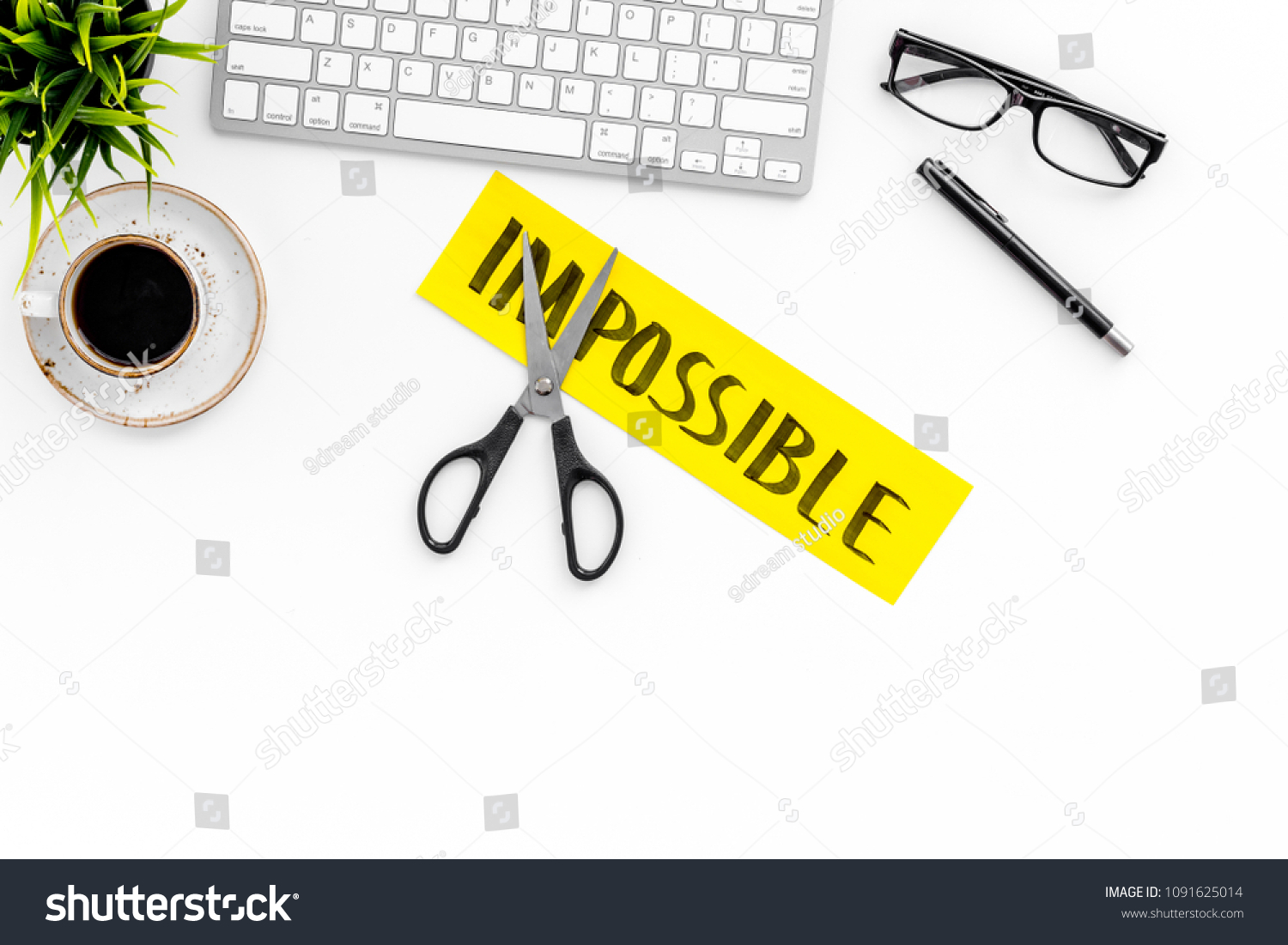 All is possible concept. Cutting the part im of written word impossible by sciccors. Office desk. White background top view copy space #1091625014