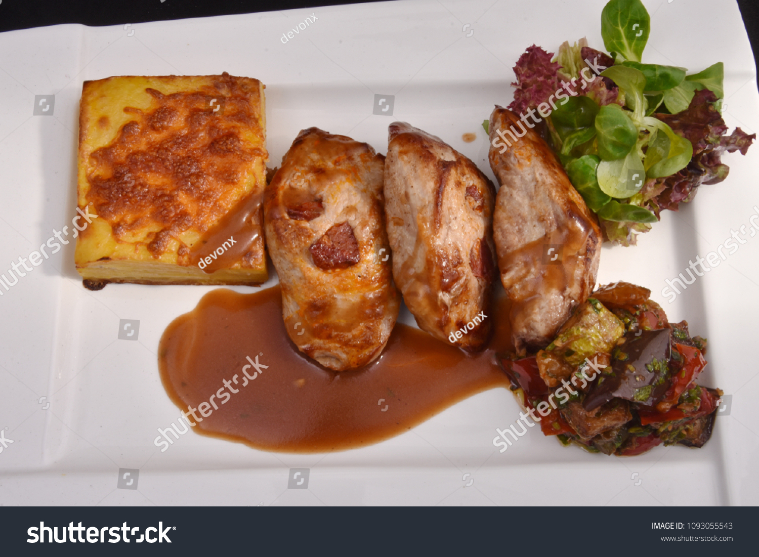 Roasted duck fillet with berry sauce and salad #1093055543