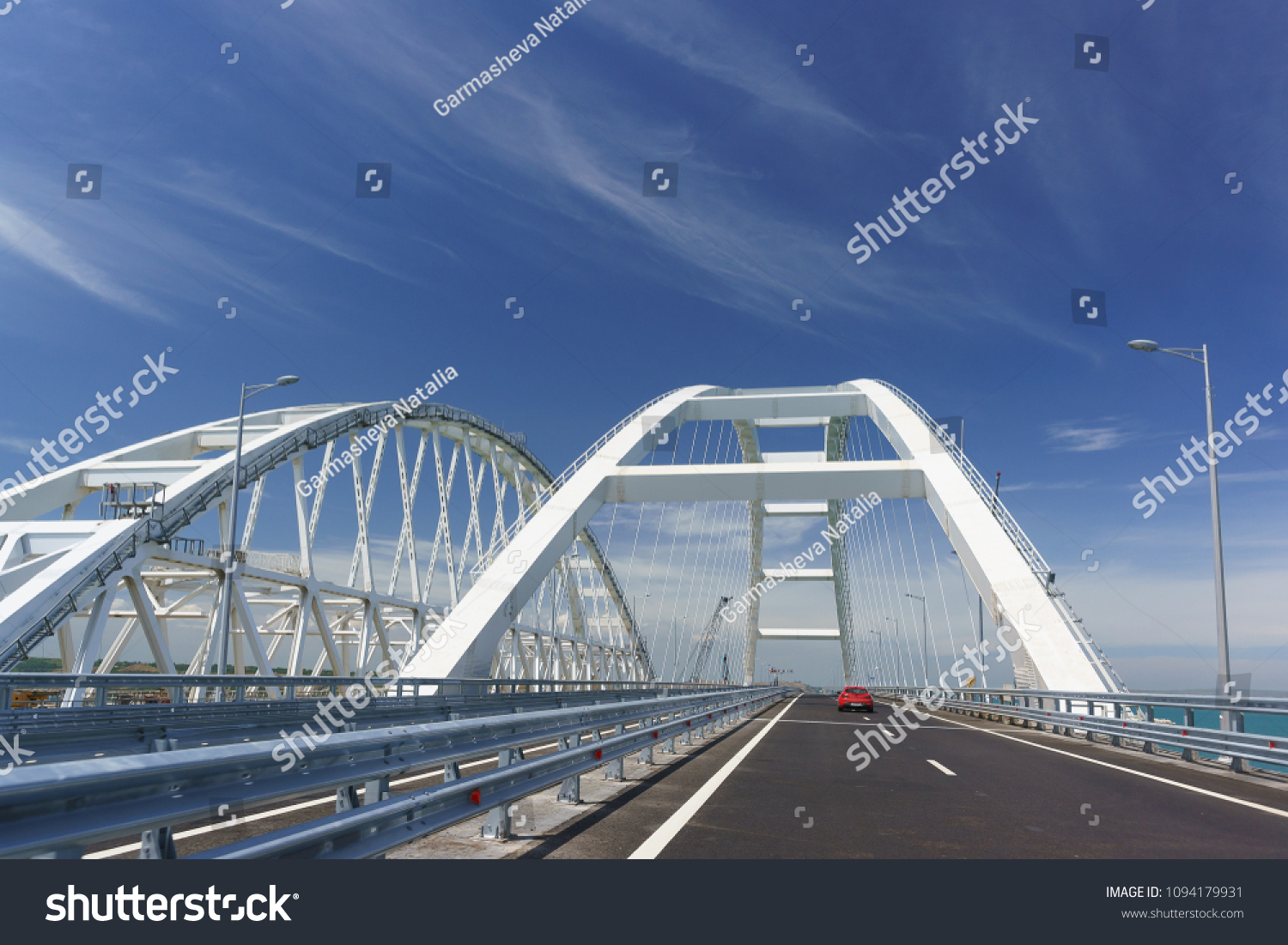Cars go on the Crimean automobile bridge connecting the banks of the Kerch Strait: Taman and Kerch, Crimea. Russia #1094179931