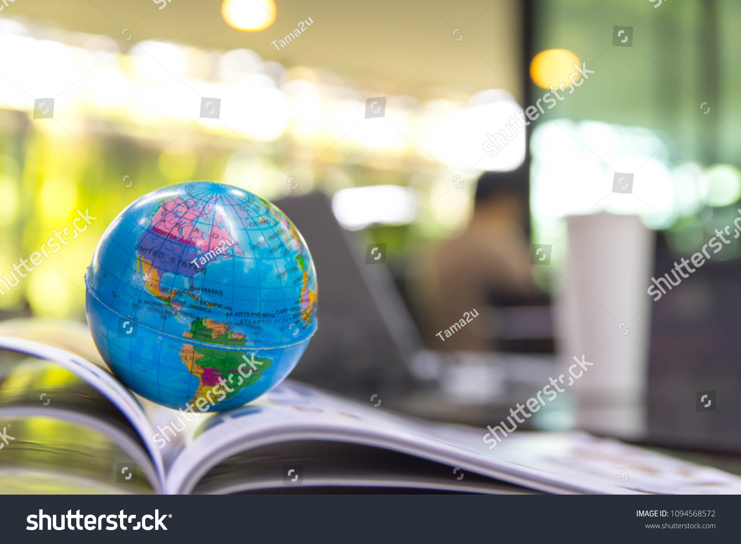 World globe on text book.
Graduate study abroad programs.    
International education school Concept.  #1094568572