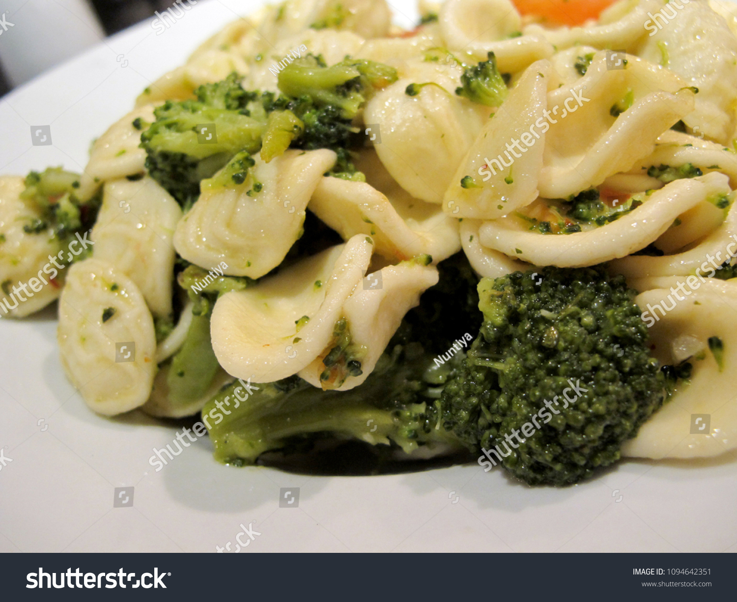 Italian Pasta with Broccoli in garlic sauce #1094642351