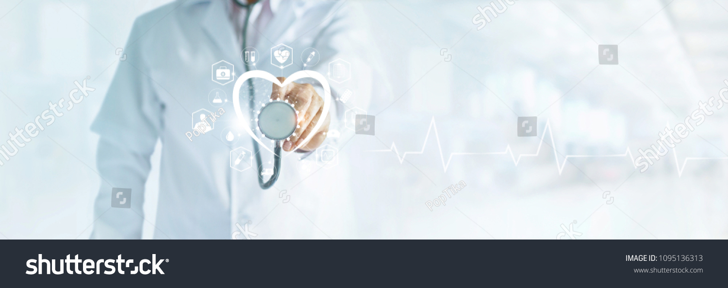 Cardiologist doctor with stethoscope in hand toching medical icon network connection on modern virtual screen networking inerface, medical technology and patient concept, blank text #1095136313
