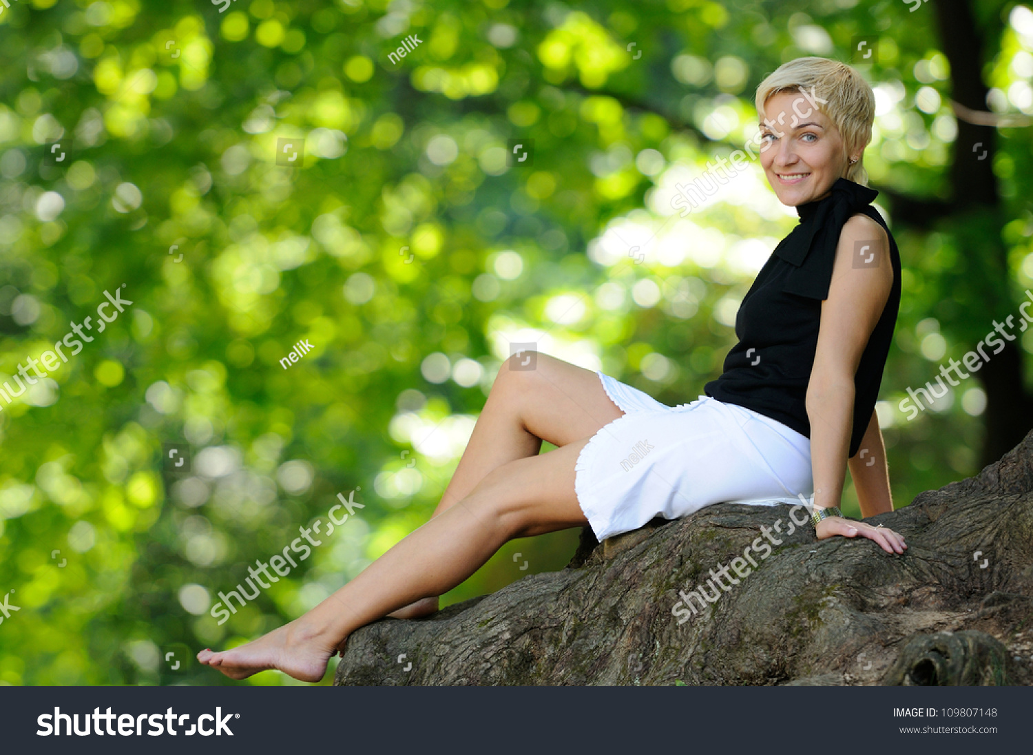 beautiful sexy woman on the nature posing near the tree on nature #109807148