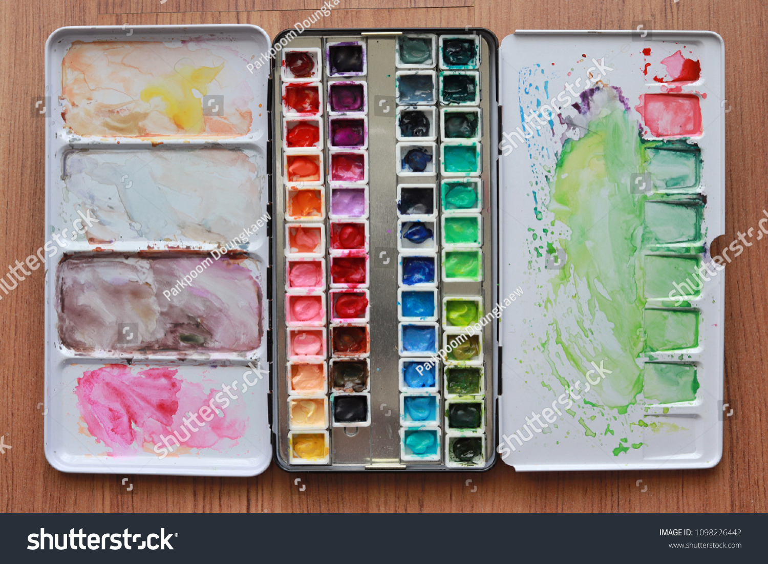 Paint accessories and watercolor on Wooden Table. (workplace mock up,Copy Space,Isolated, White Copy space,Color Copy space, Blank Copy Space, Wood Copy Space.) #1098226442