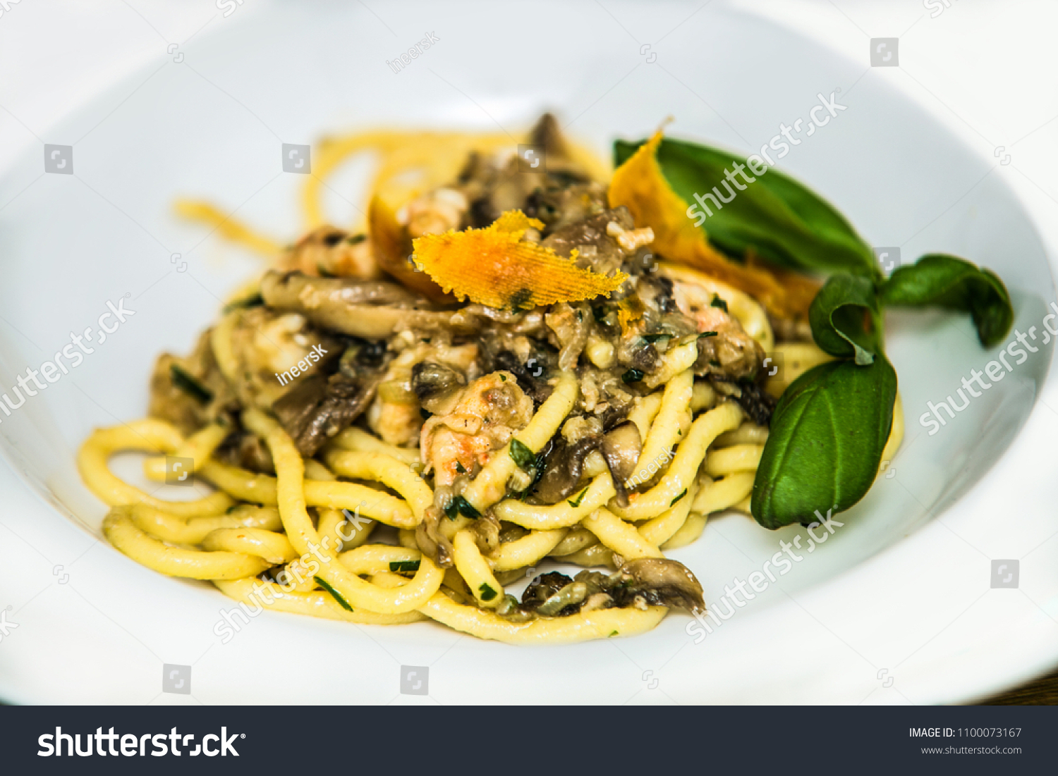 Pasta in souce on plate. Delicious pasta. Food detail.Traditional italian cuisine #1100073167