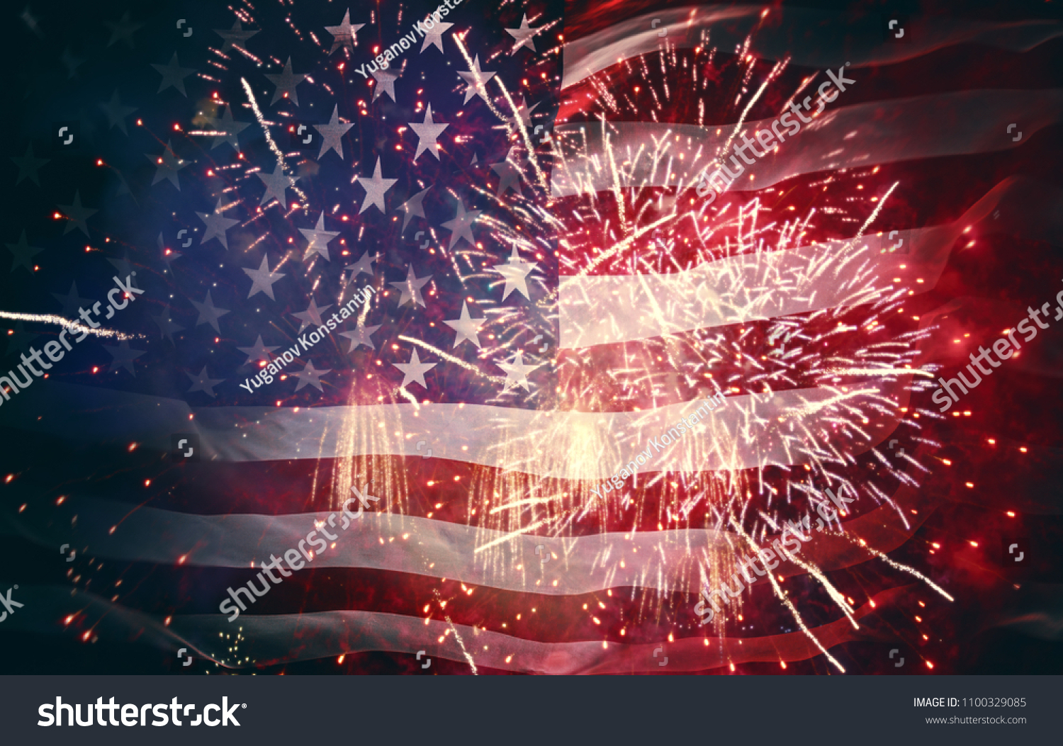 Patriotic holiday. The USA are celebrating 4th of July. American flag on background of fireworks. #1100329085