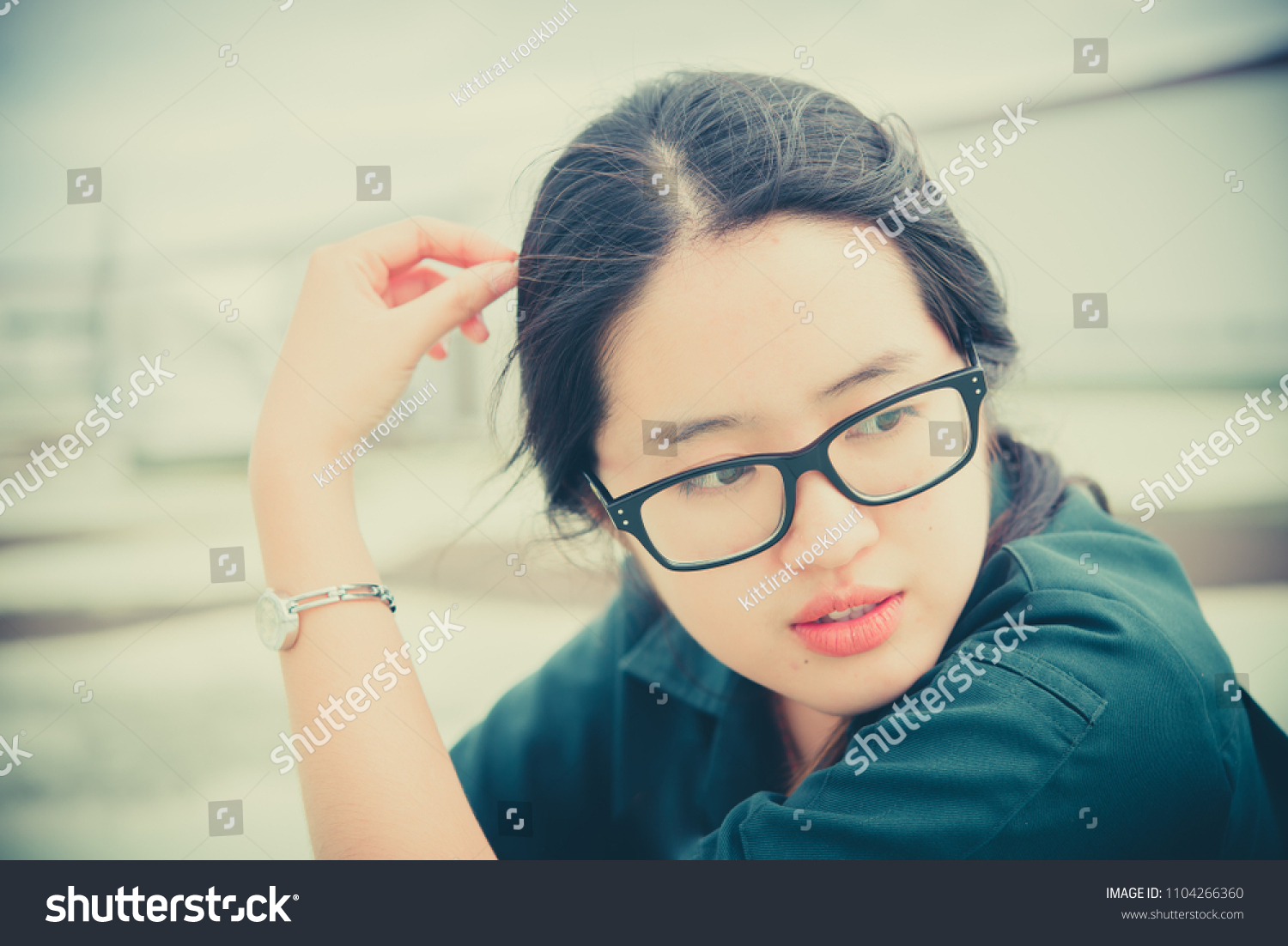 Close up beautiful asian woman wear glasses,Thai girl very pretty,sad woman concept,heartbreak from love,broken heart from boyfriend #1104266360