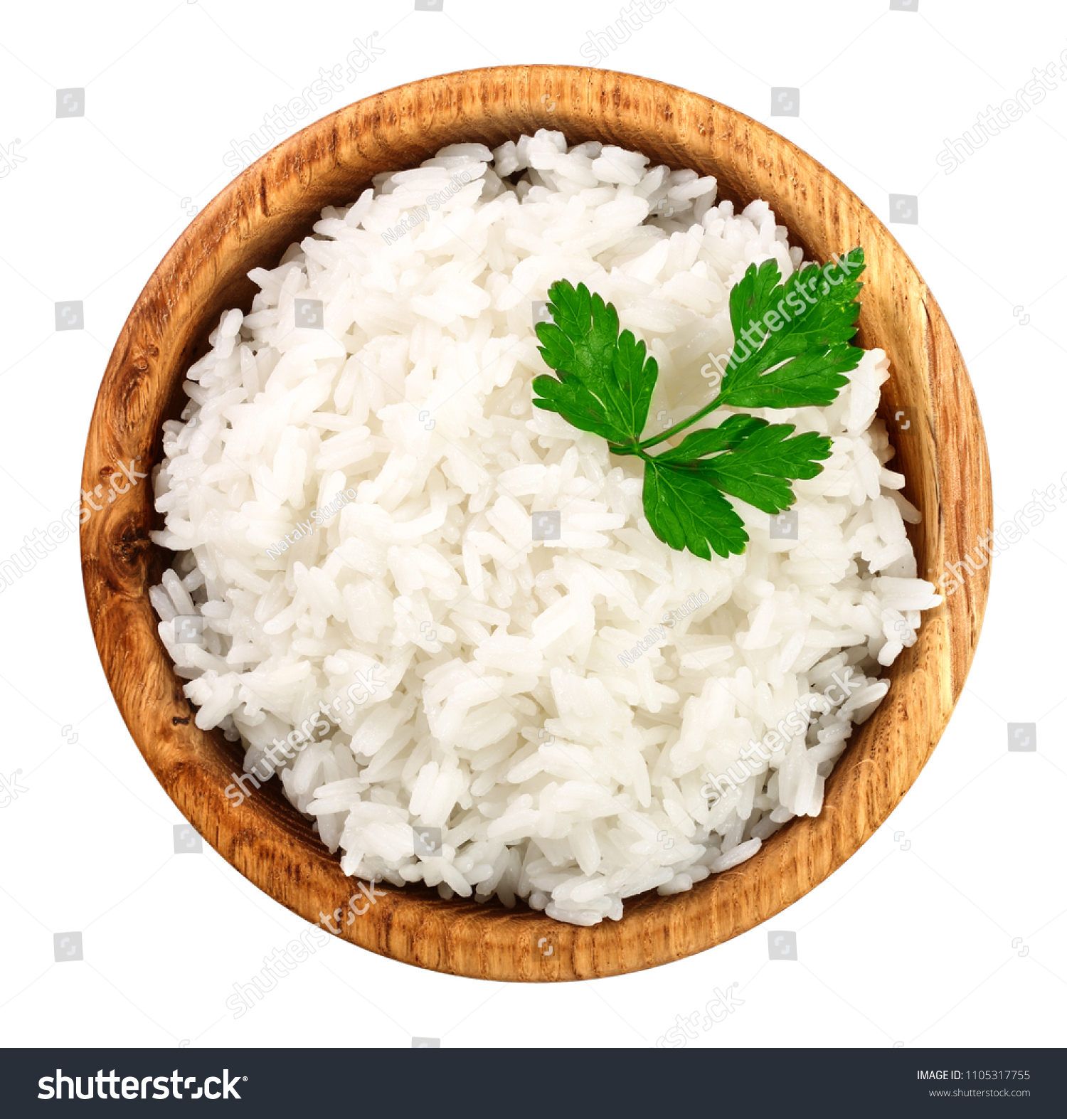 rice in a wooden bowl isolated on white background. Top view. Flat lay #1105317755