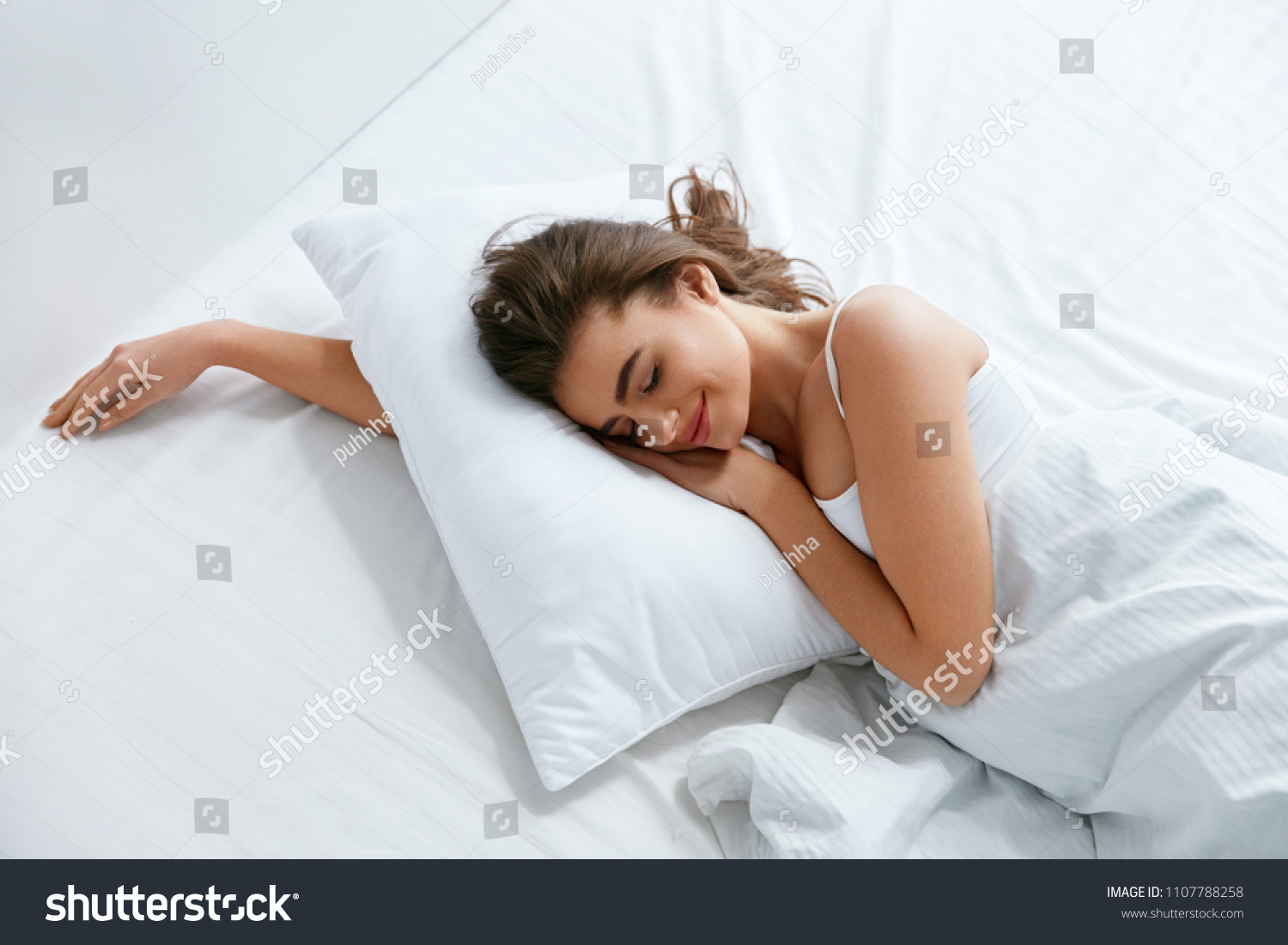 Pillows. Woman Resting On White Pillow Sleeping In Bed #1107788258