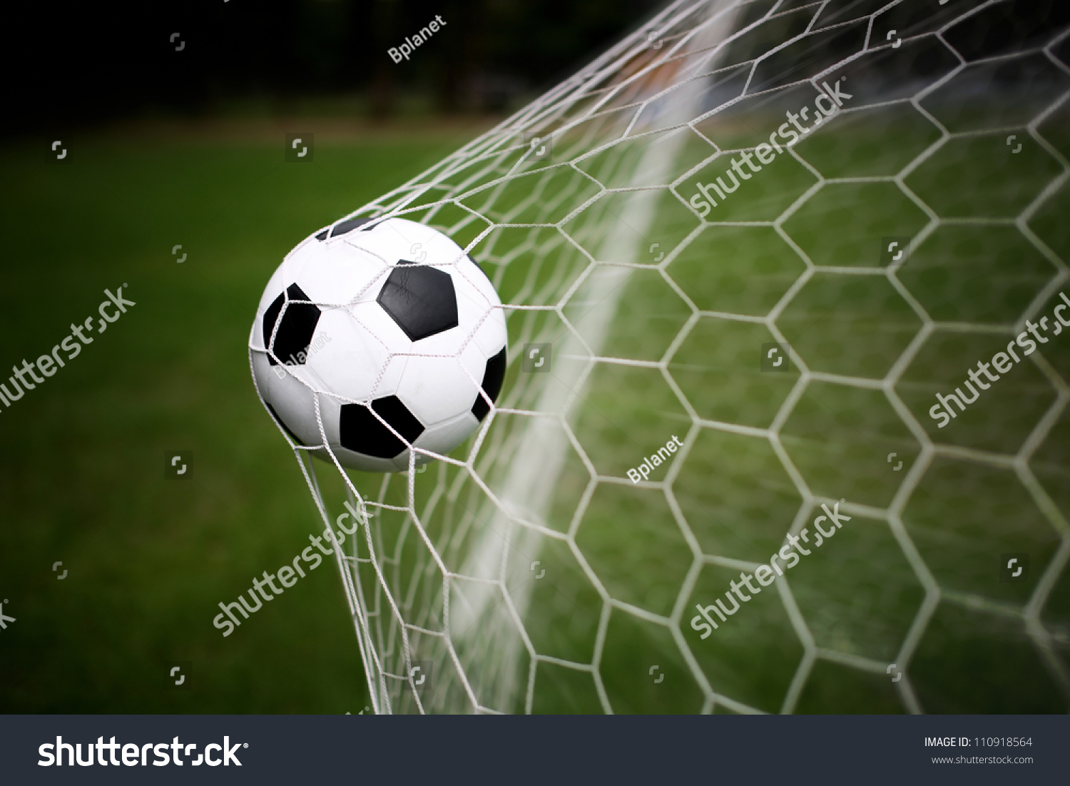 soccer ball in goal #110918564