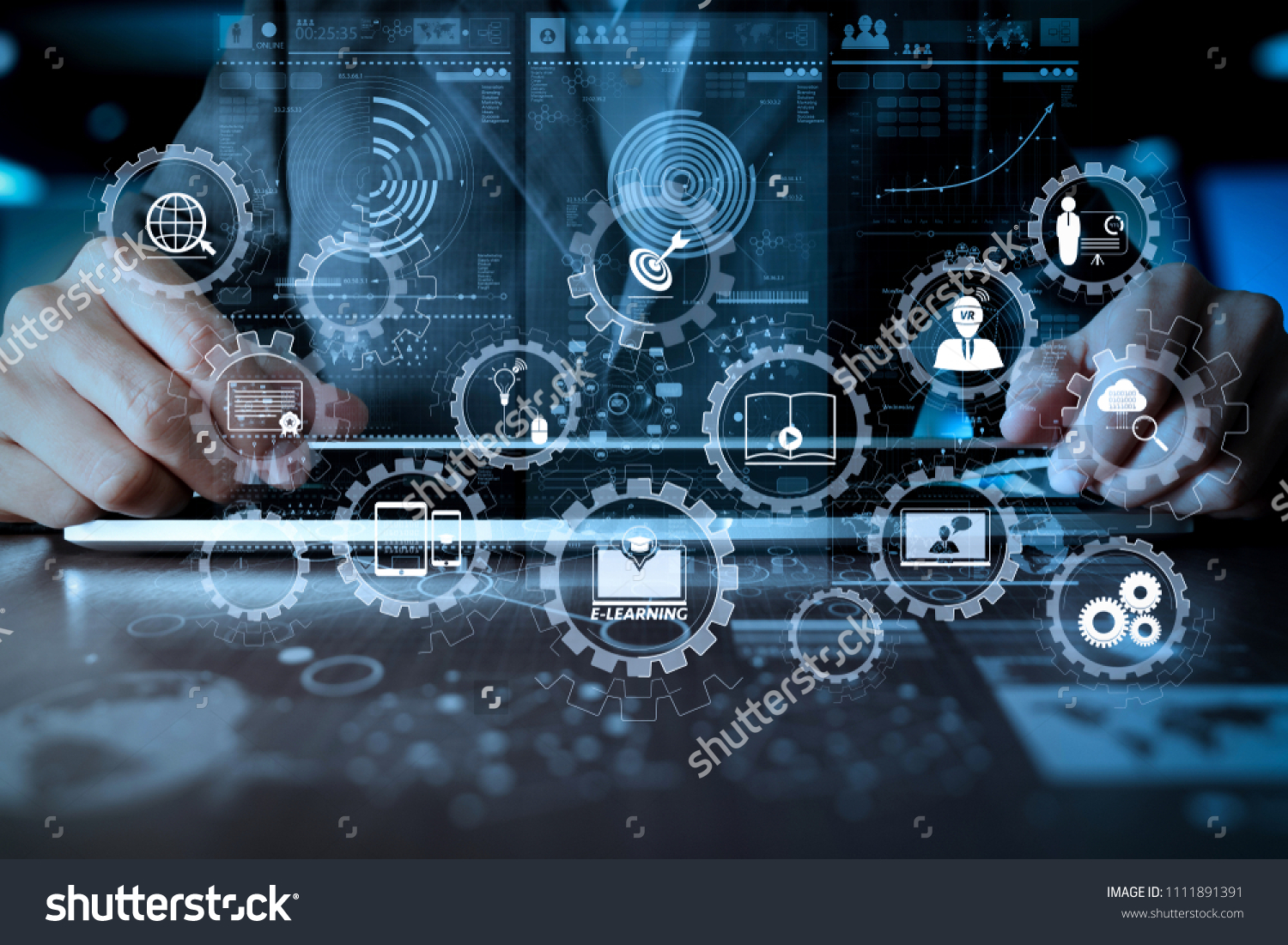 E-learning with connected gear cogs connected diagram virtual dashboard.business man hand working on laptop computer with digital layer business strategy and social media diagram on wooden desk   #1111891391