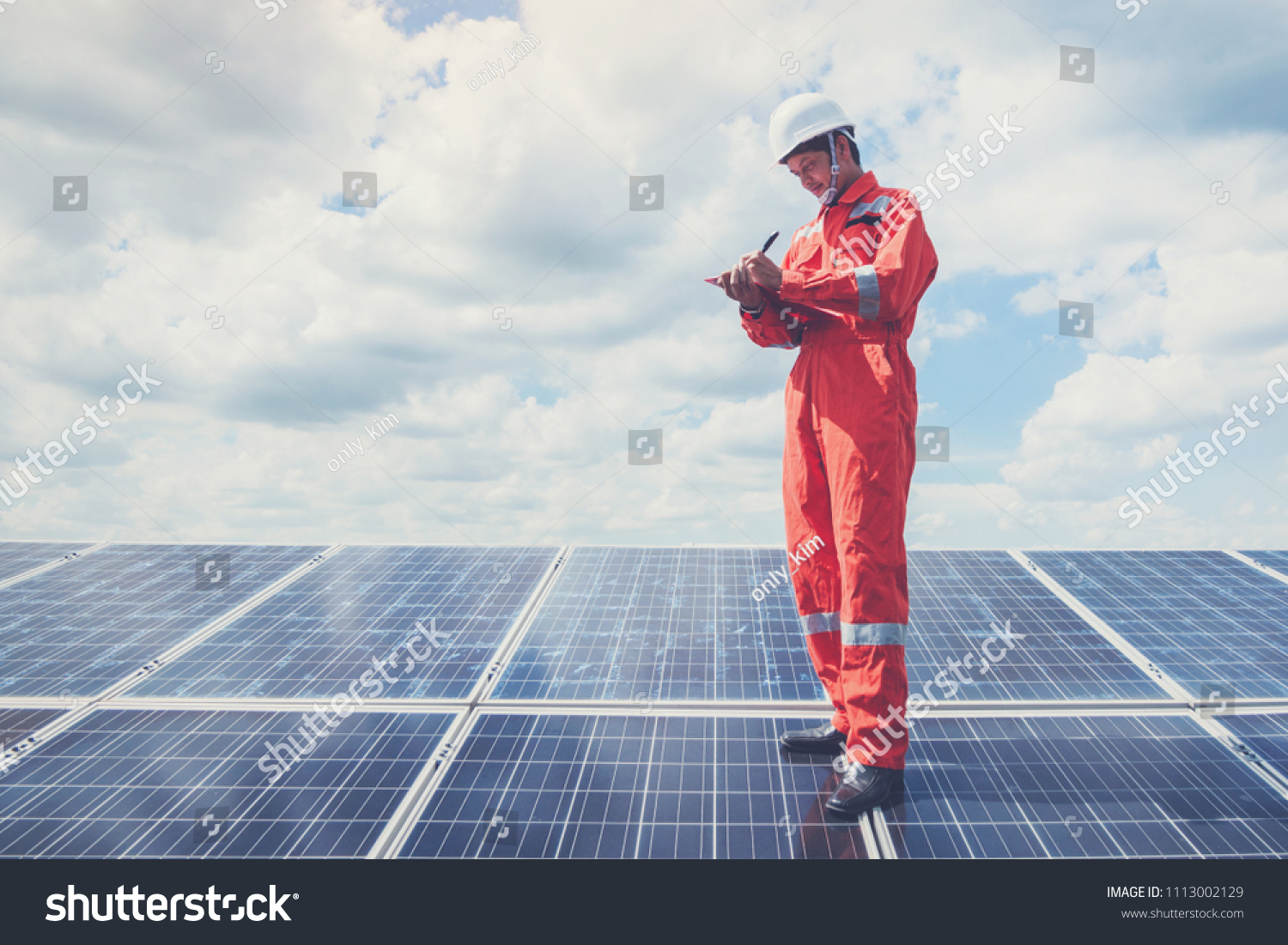 operation and maintenance in solar power plant ; engineering team working on checking and maintenance in solar power plant ,solar power plant to innovation of green energy for life
 #1113002129