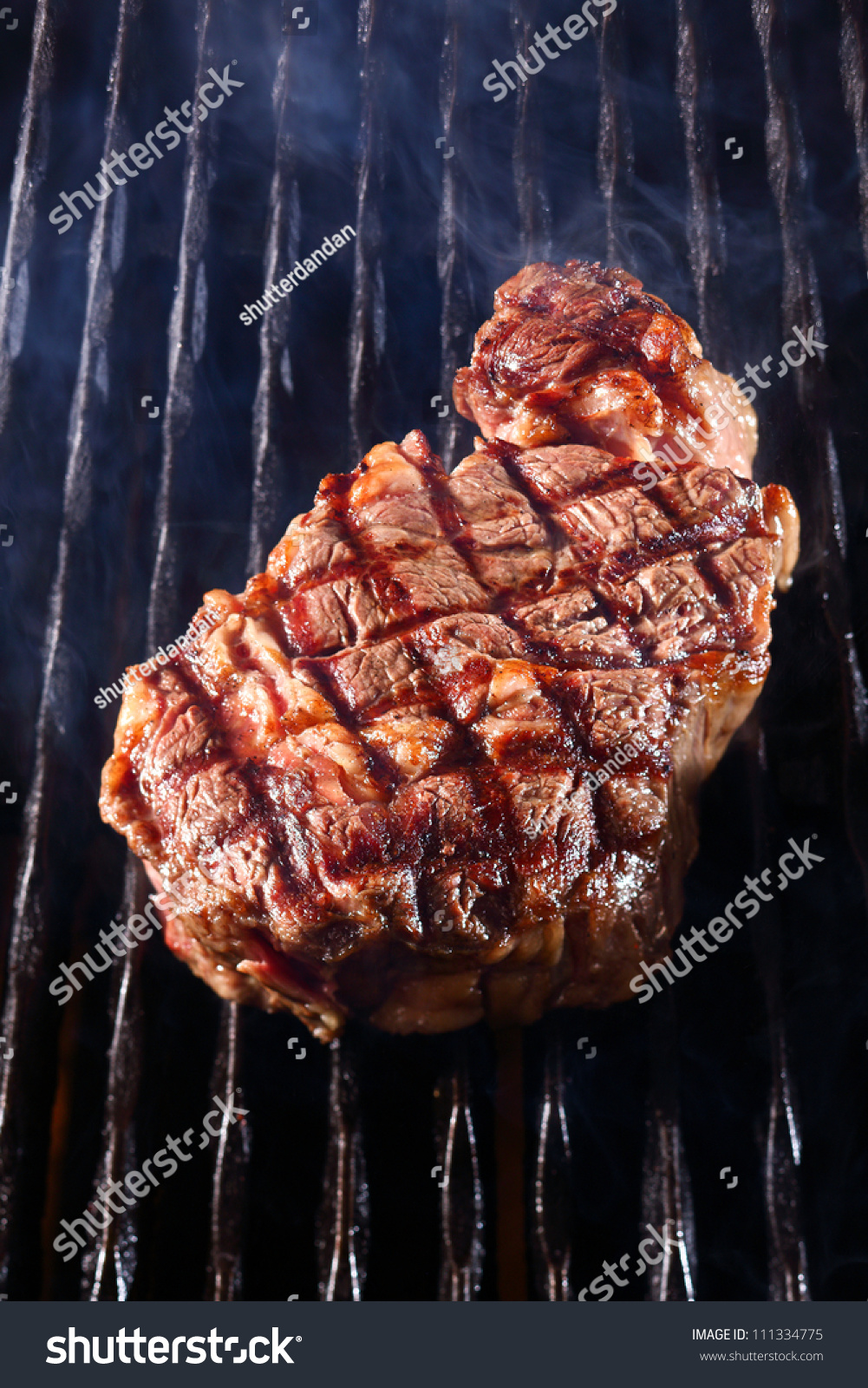 juicy steak on the grill #111334775