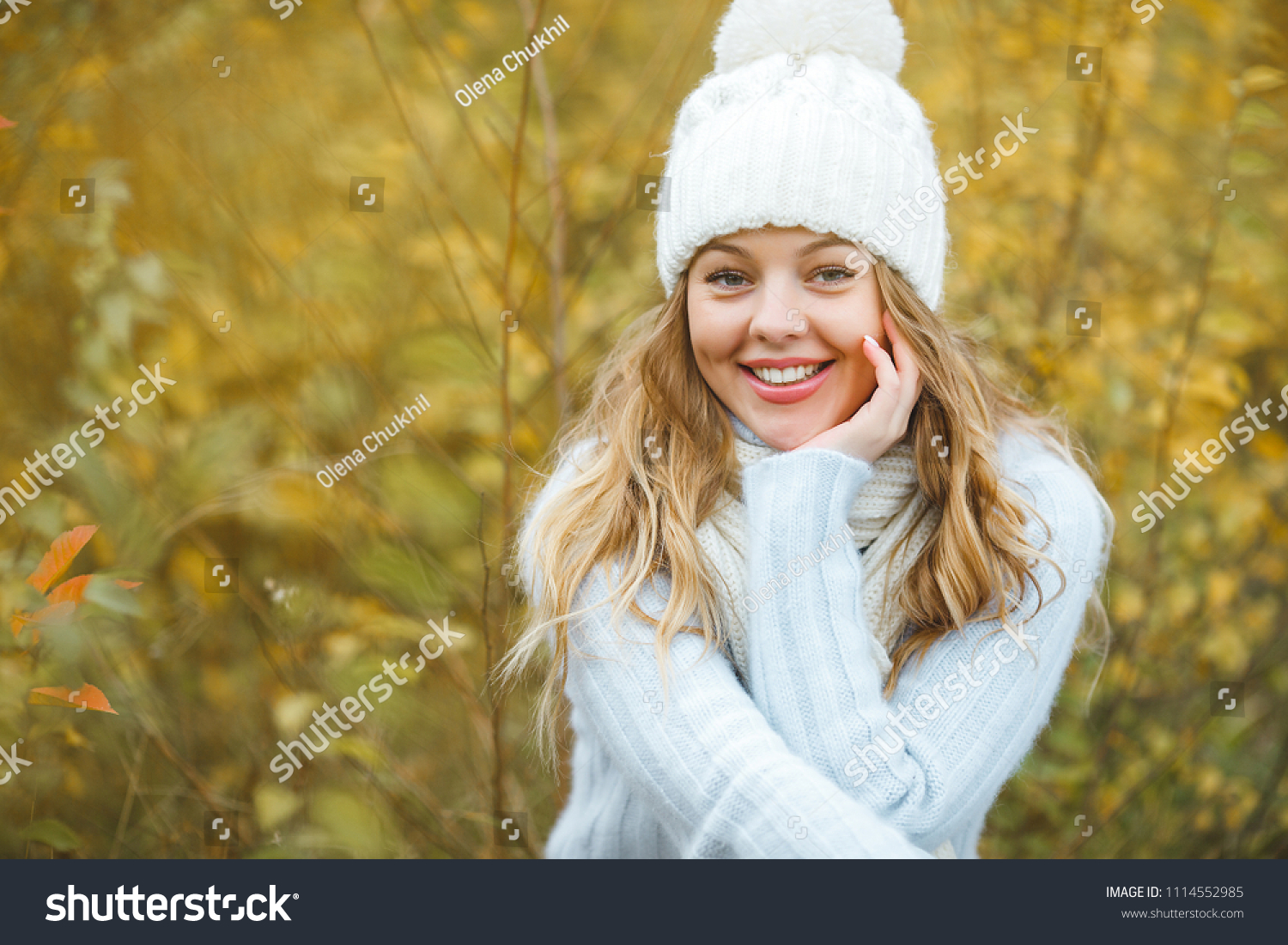Young attractive woman in autumn colorful background #1114552985