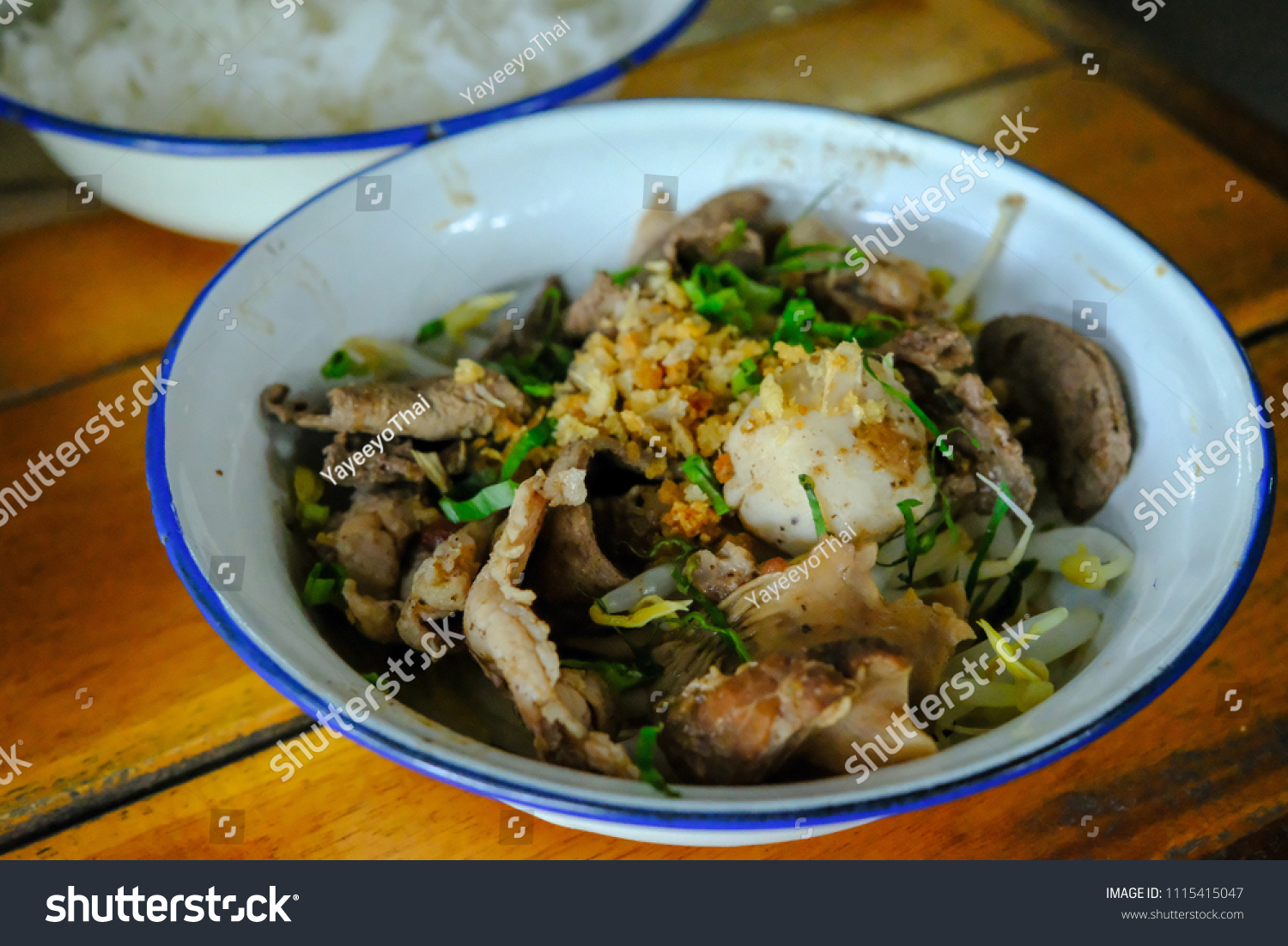  Boiled pork and pig liver in a bowl ,Served with delicious hot steam rice. Thai food. #1115415047