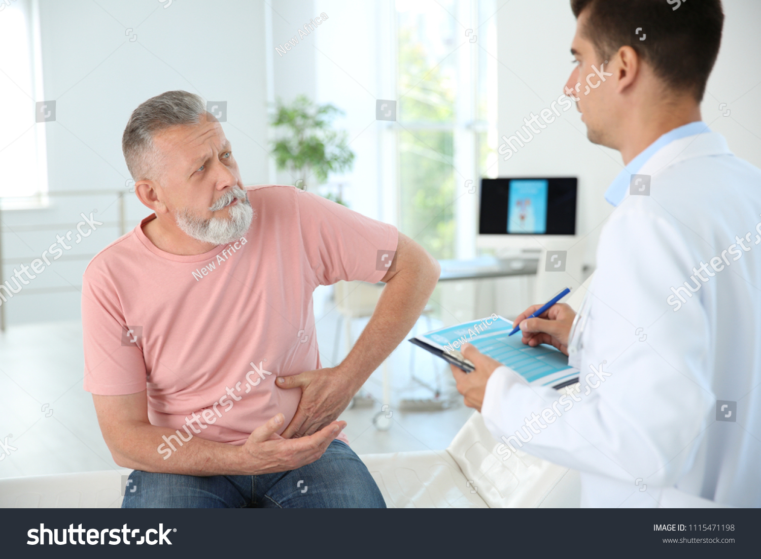 Man with health problem visiting urologist at hospital #1115471198