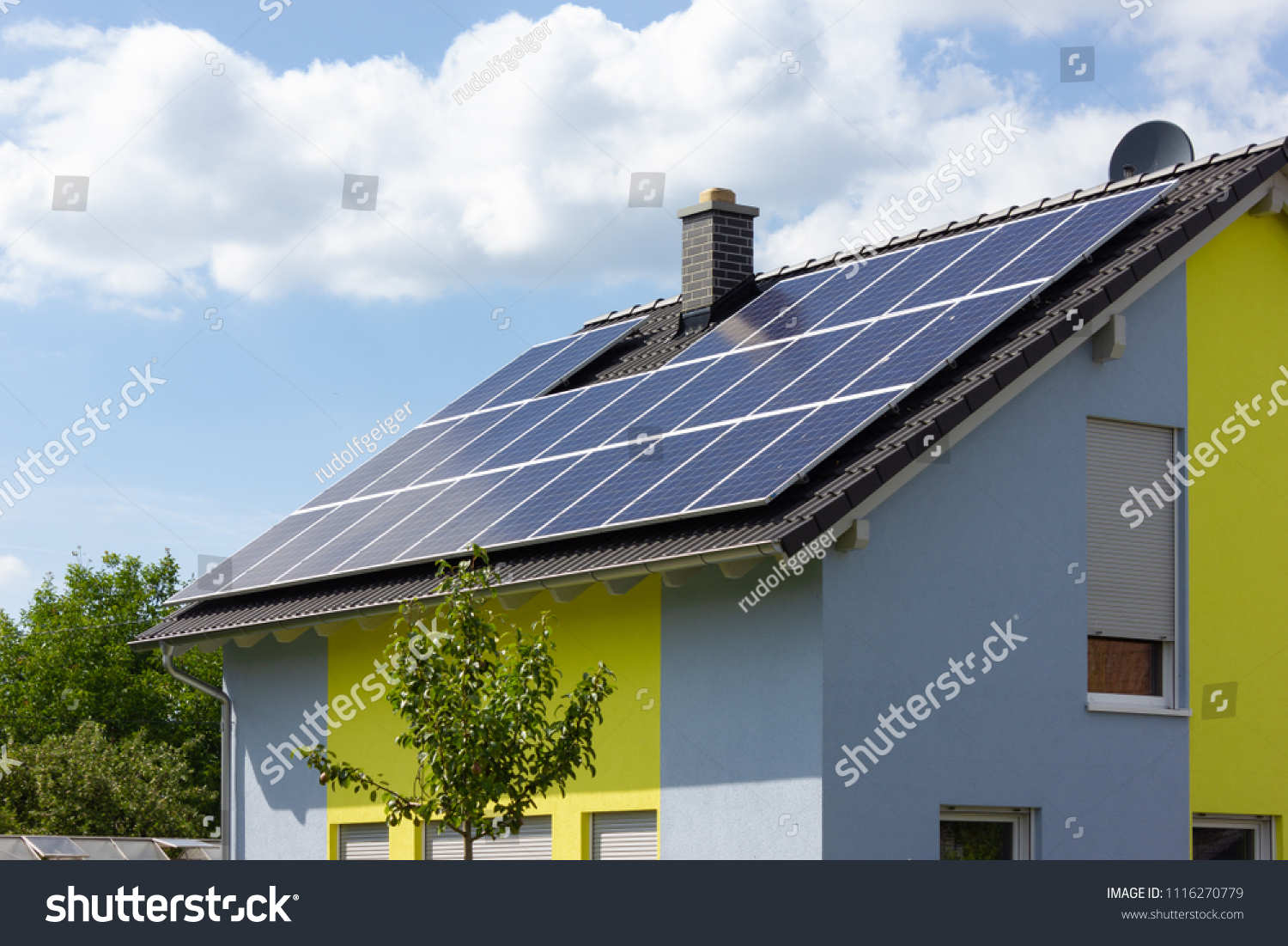 solar panel on rooftop of south german rural village at springtime near city of stuttgart #1116270779