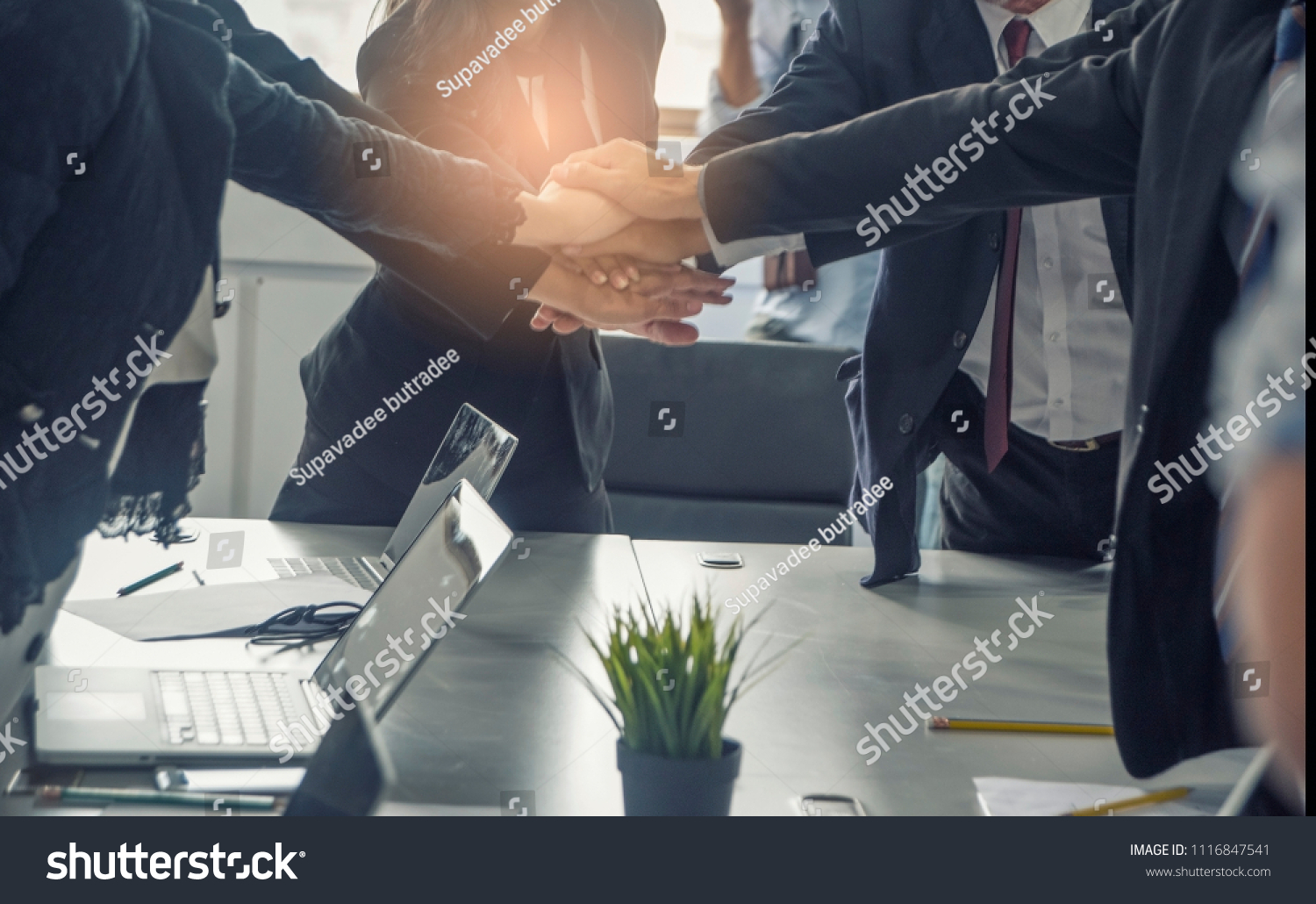 Business people putting their hands together. Hand  ,Unity ,success and teamwork concept. #1116847541