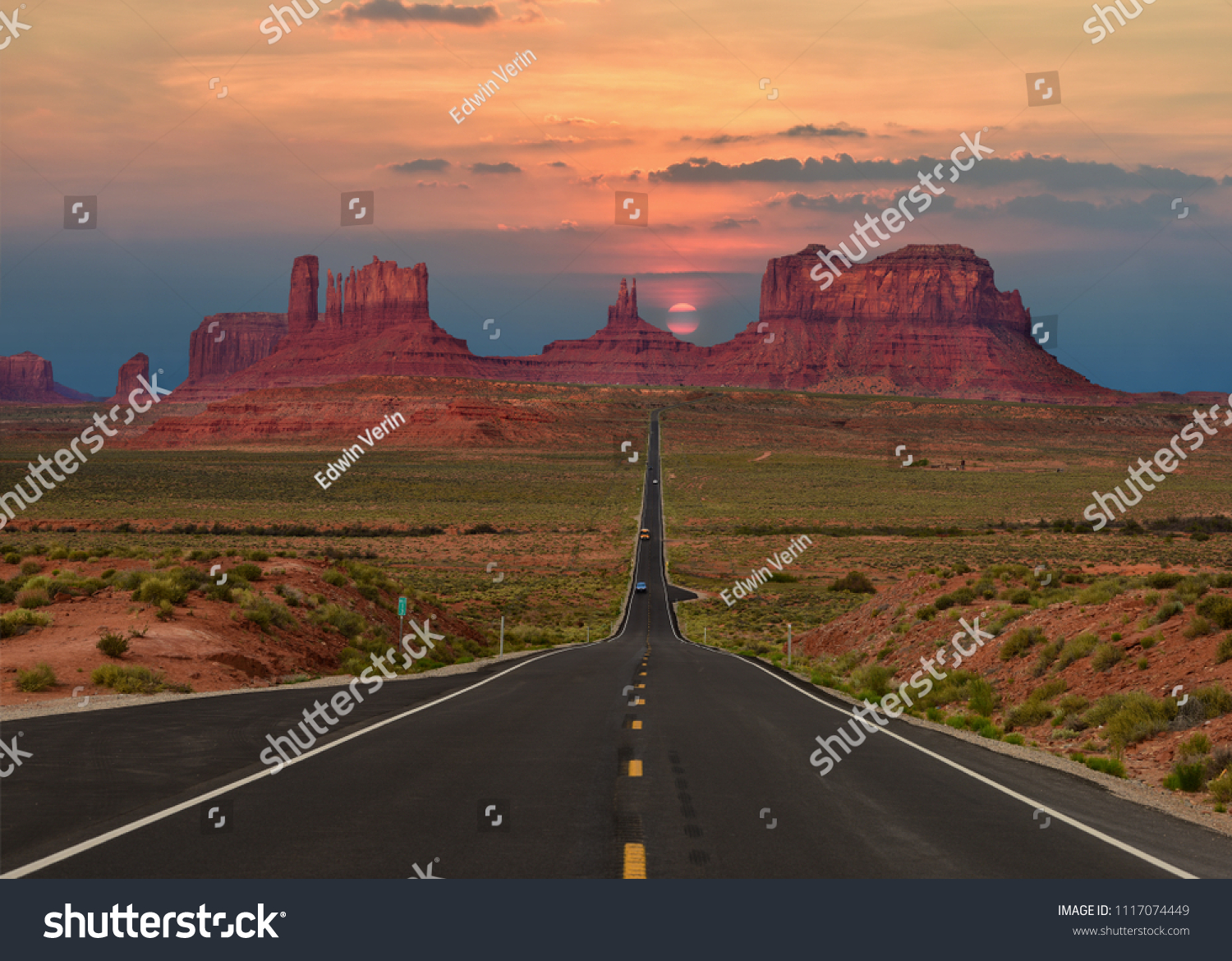 Scenic highway in Monument Valley Tribal Park in Arizona-Utah border, U.S.A. at sunset. #1117074449