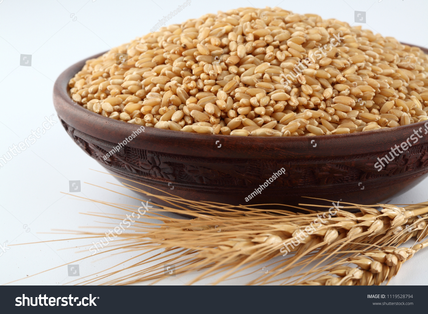 Wheat grains ,Grain of the wheat , whole wheat grains #1119528794