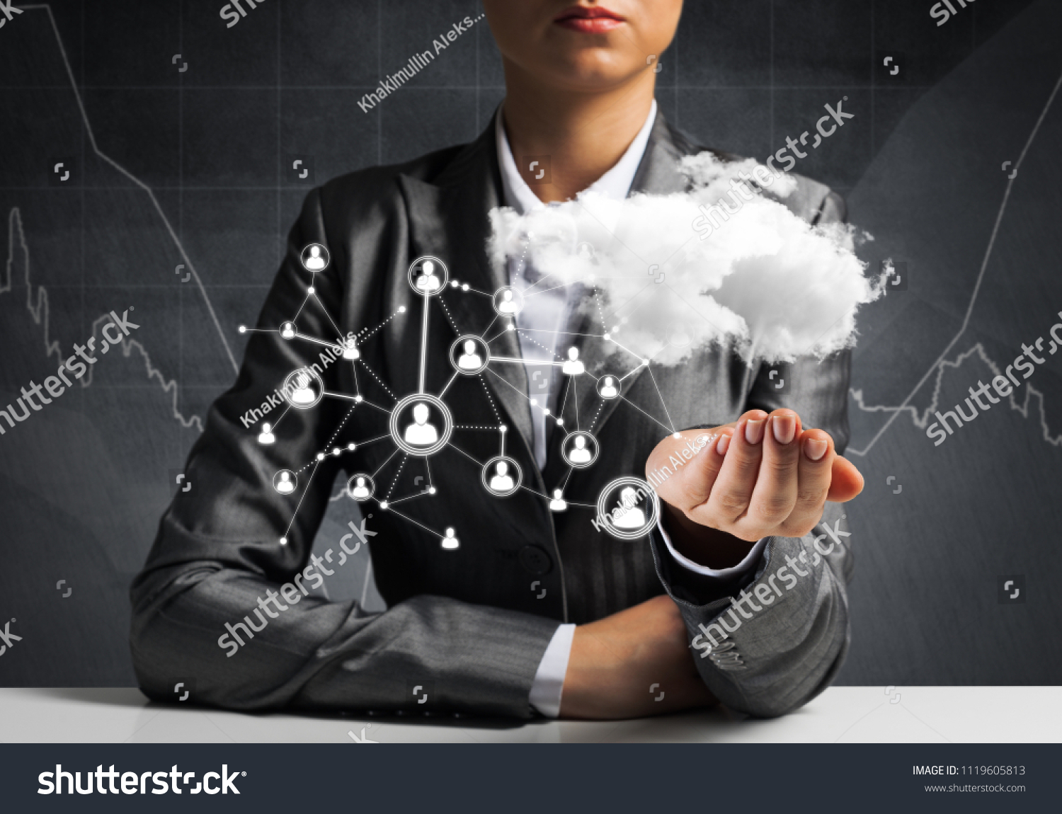 Businessman in suit keeping cloud with network connections in hand with business sketches on background. #1119605813