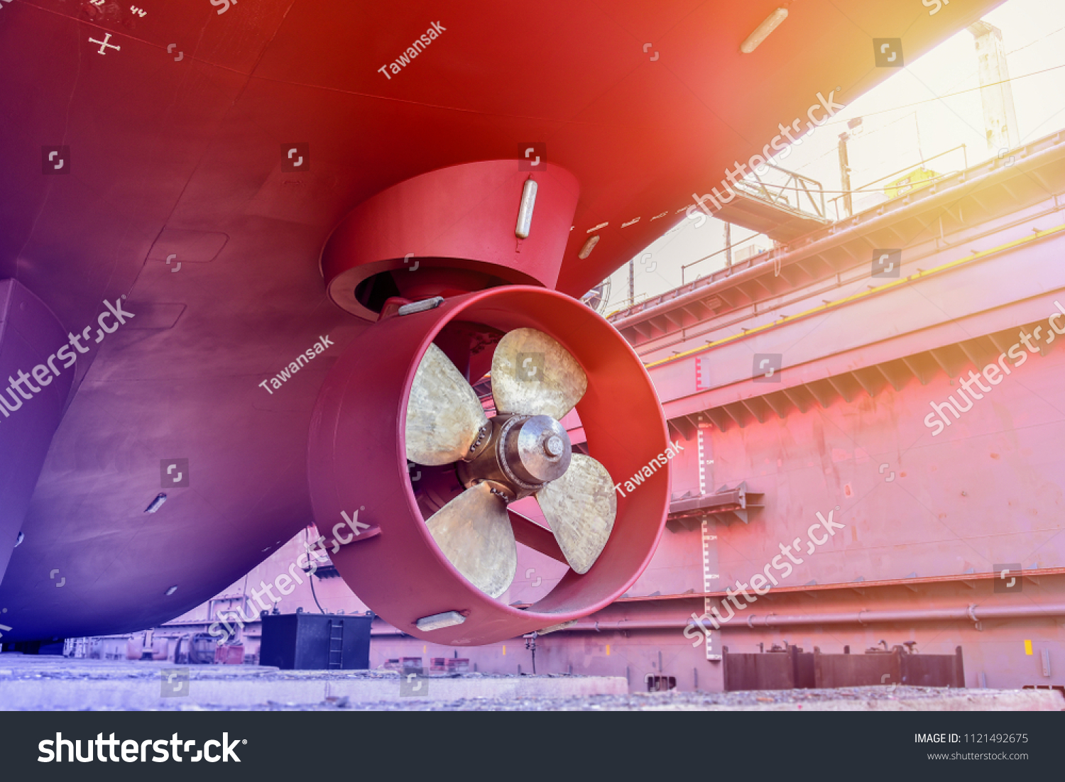 Propeller during to repair already of big Cargo ship Stern Bow thruster freshly fitted in a boat hull at floating dock in shipyard Thailand #1121492675