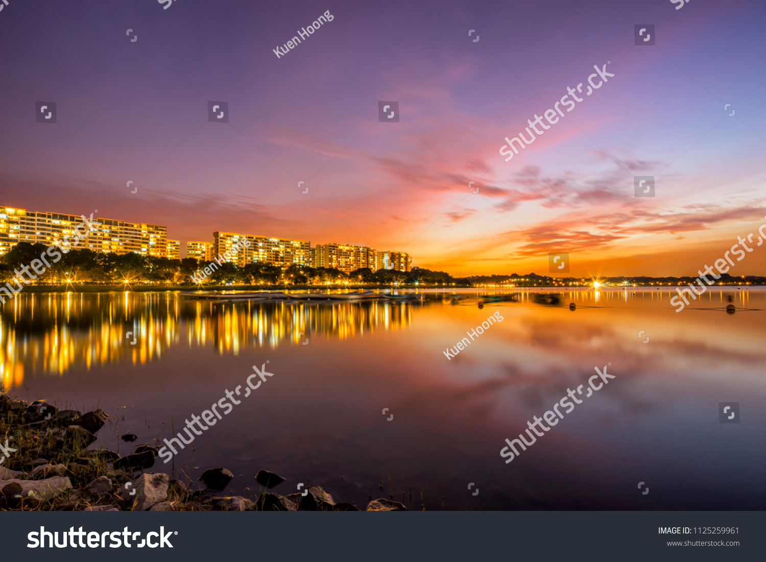 Sunset view of Bedok Reservoir, Singapore with colorful skyline and reflection #1125259961