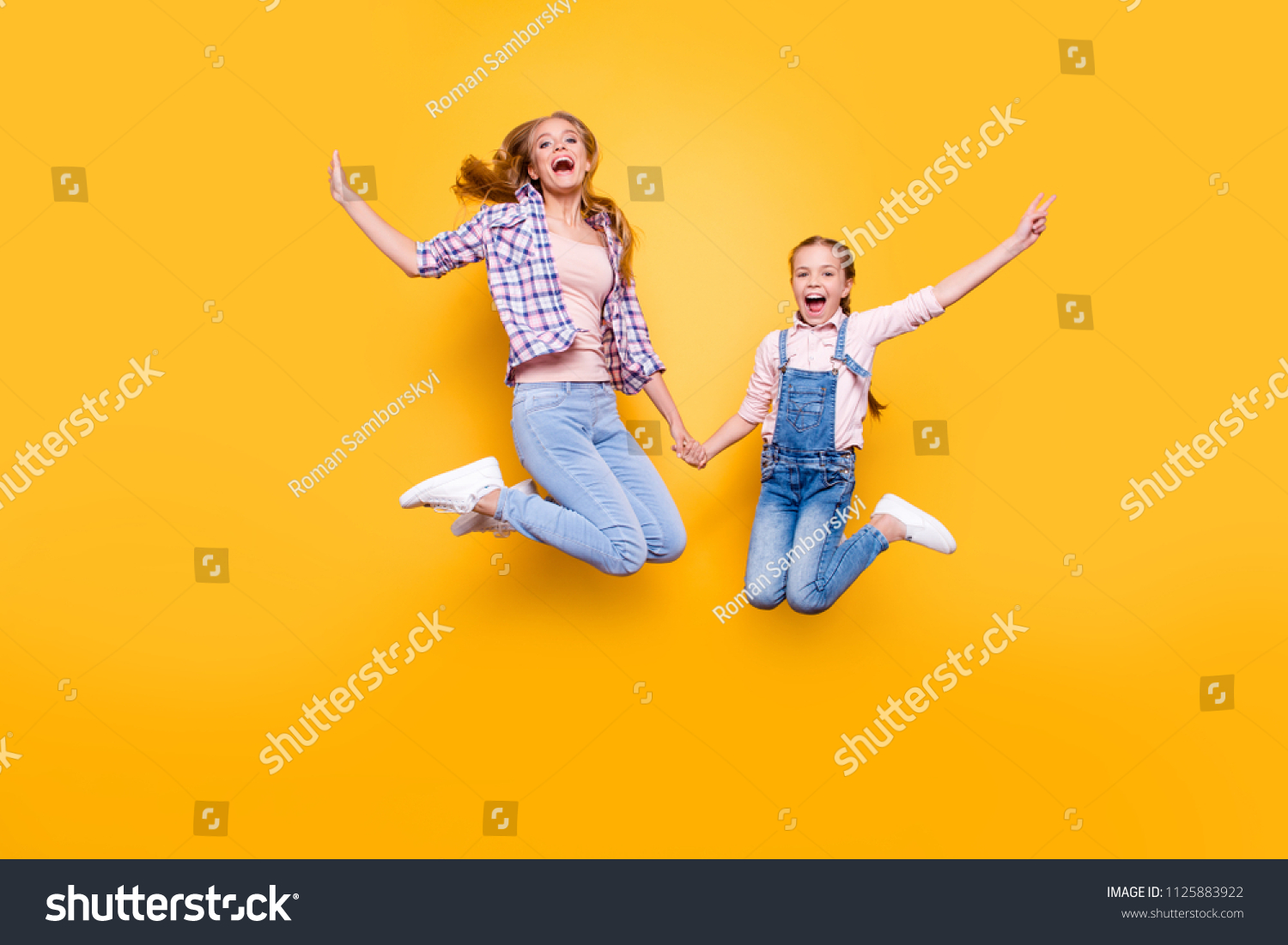 Mom mum mommy maternity two people best friendship upbringing rejoicing concept. Full length size portrait of cheerful joyful stylish modern relatives jumping up in air isolated on bright background #1125883922