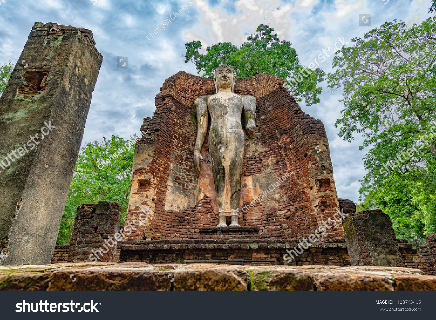 Kamphaeng Phet Historical Park is an archeological site in Kamphaeng Phet , Kamphaeng Phet Historical Park Arunyik area , Impressive Buddha Statues at Kamphaeng Phet Historical Park.
 #1128743405