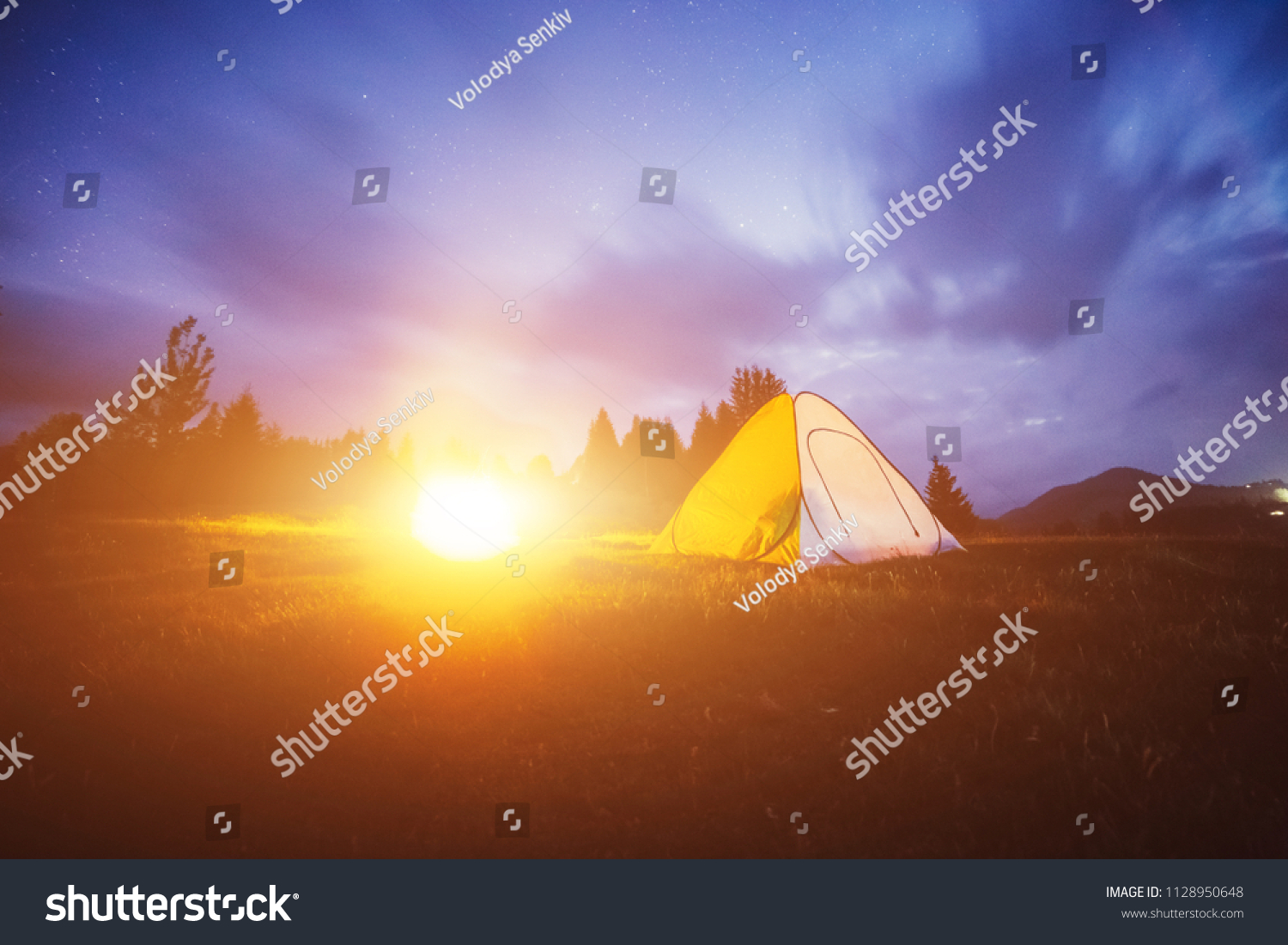 Tent in the mountains. Night photo
 #1128950648