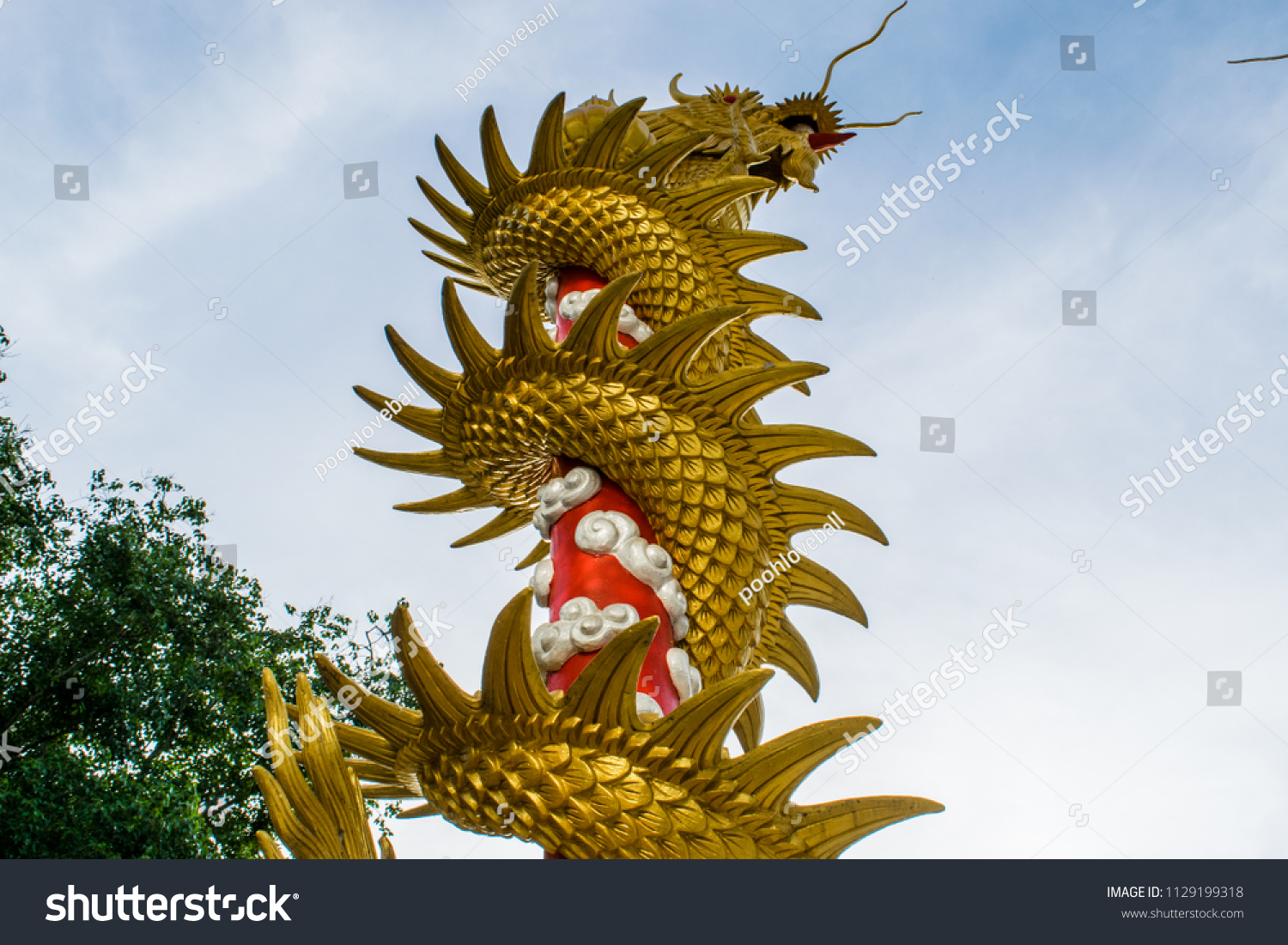 Numerous dragons coiled round pillars #1129199318