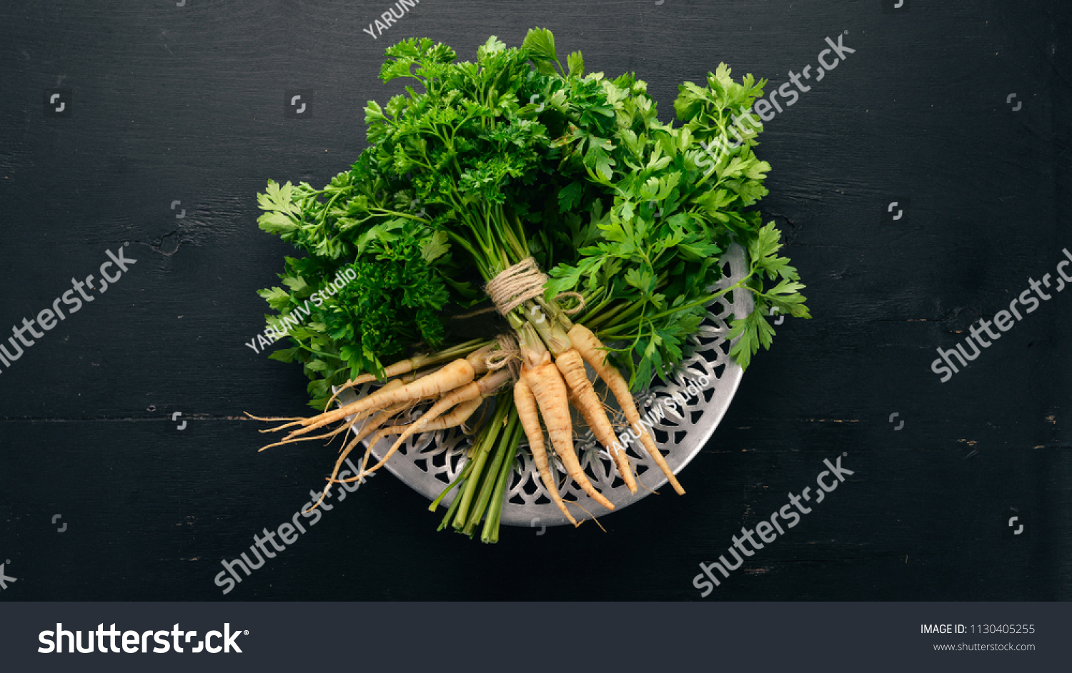 Fresh green parsley. Root parsley. On a wooden background. Top view. Copy space. #1130405255