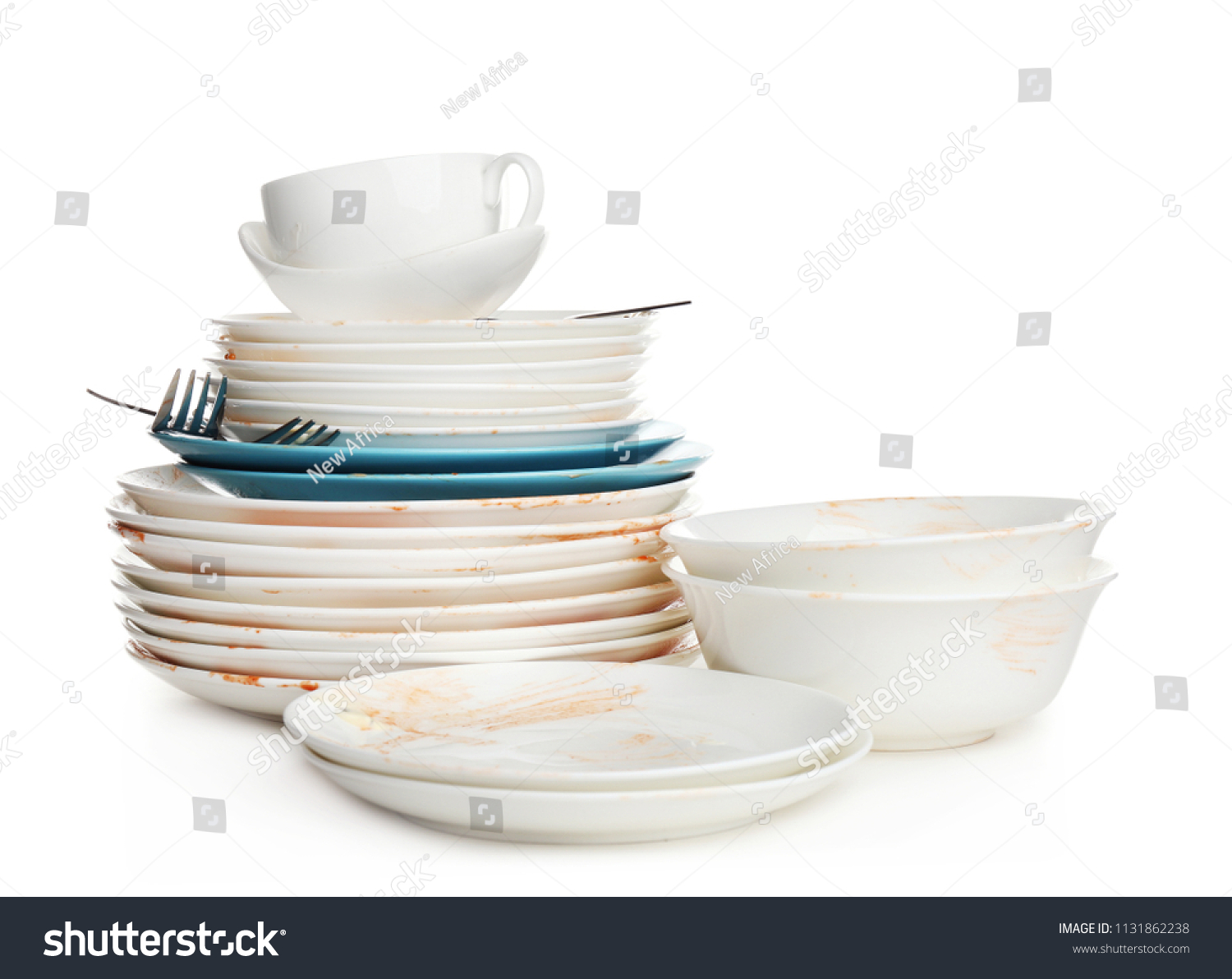 Pile of dirty kitchenware on white background #1131862238