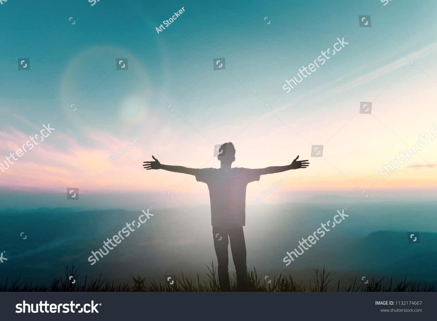 Silhouette enjoy back japanese man open arm love on sunset nature mountain reborn in hope praise God good night dawn wide. Positive yourself male success life concept breath passion wisdom wellbeing. #1132174667